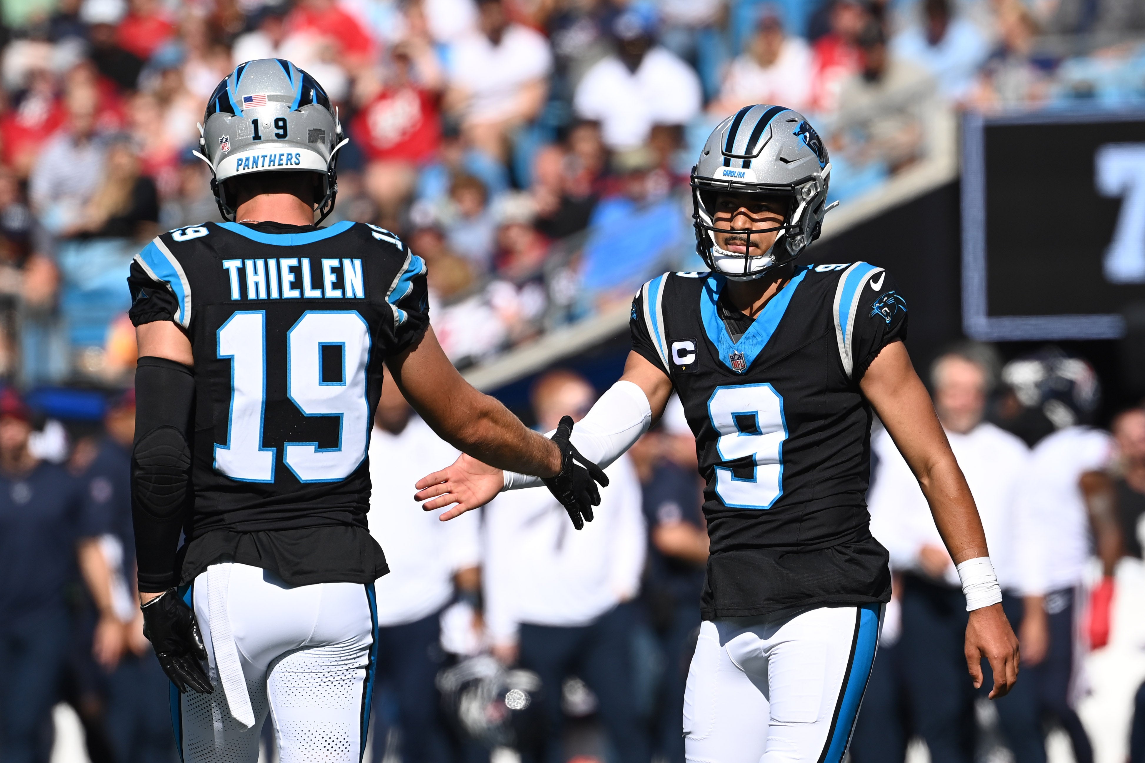 Oct 29, 2023; Charlotte, North Carolina, USA; Carolina Panthers wide receiver Adam Thielen (19) and quarterback Bryce Young (9) react in the second quarter at Bank of America Stadium. Mandatory Credit: Bob Donnan-USA TODAY Sports