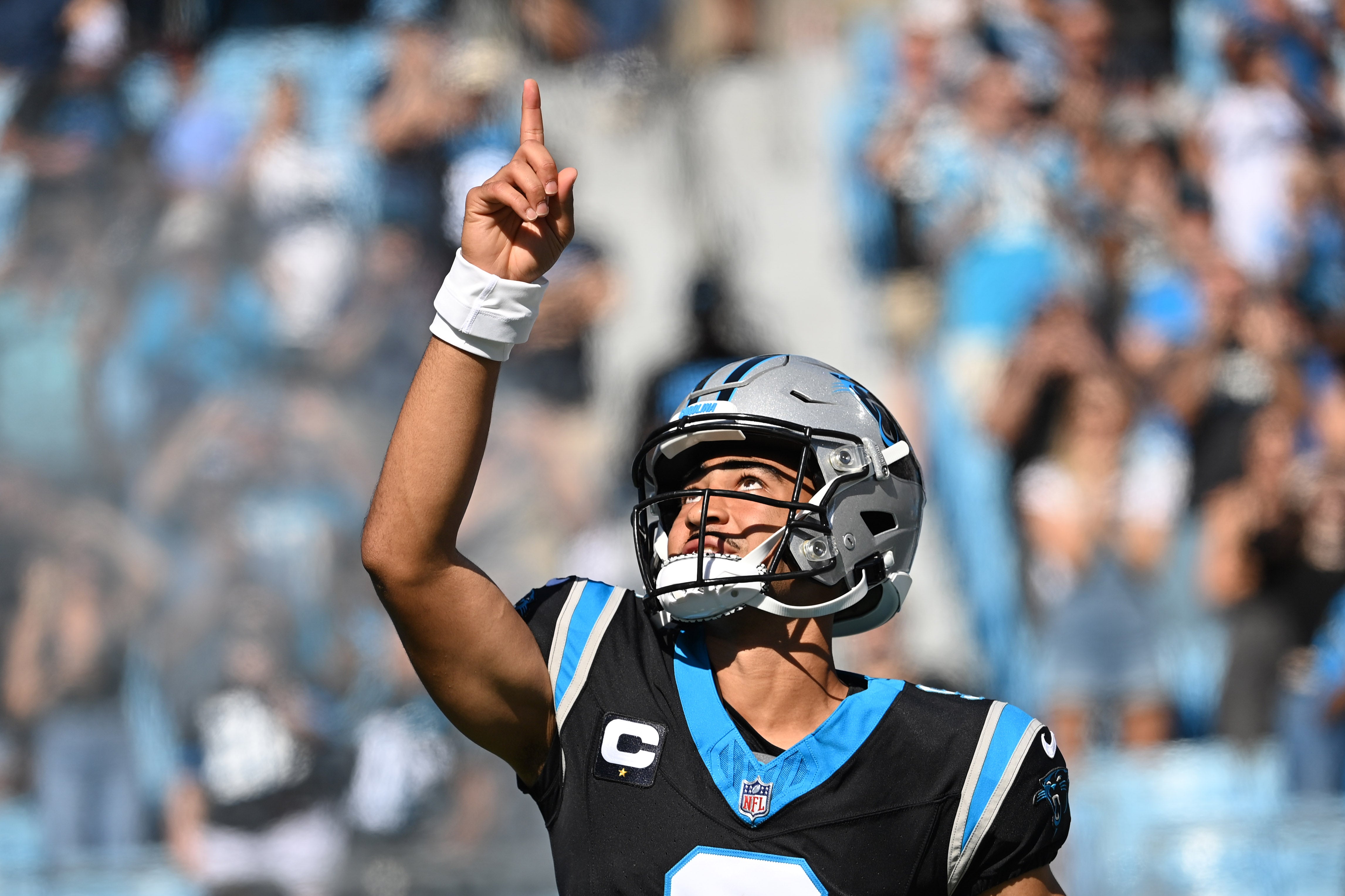 Oct 29, 2023; Charlotte, North Carolina, USA; Carolina Panthers quarterback Bryce Young (9) runs on to the field before the game at Bank of America Stadium. Mandatory Credit: Bob Donnan-USA TODAY Sports