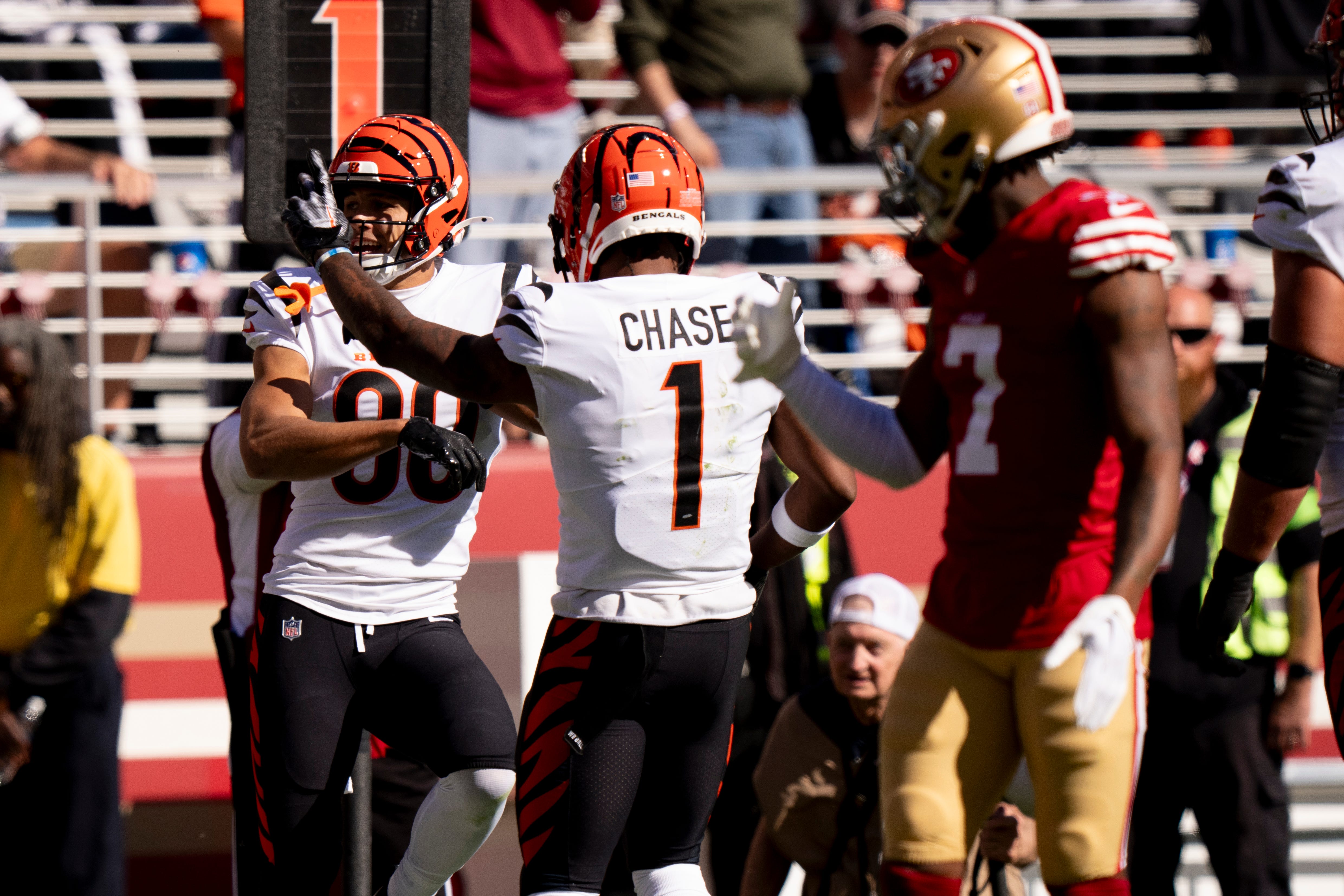 Cincinnati Bengals wide receiver Andrei Iosivas (80) celebrates with Cincinnati Bengals wide receiver Ja'Marr Chase (1) after scoring a touchdown in the first quarter of the NFL game between the Cincinnati Bengals and the San Francisco 49ers at Levi's Stadium in Santa Clara, Calif., on Sunday, Oct 29, 2023.