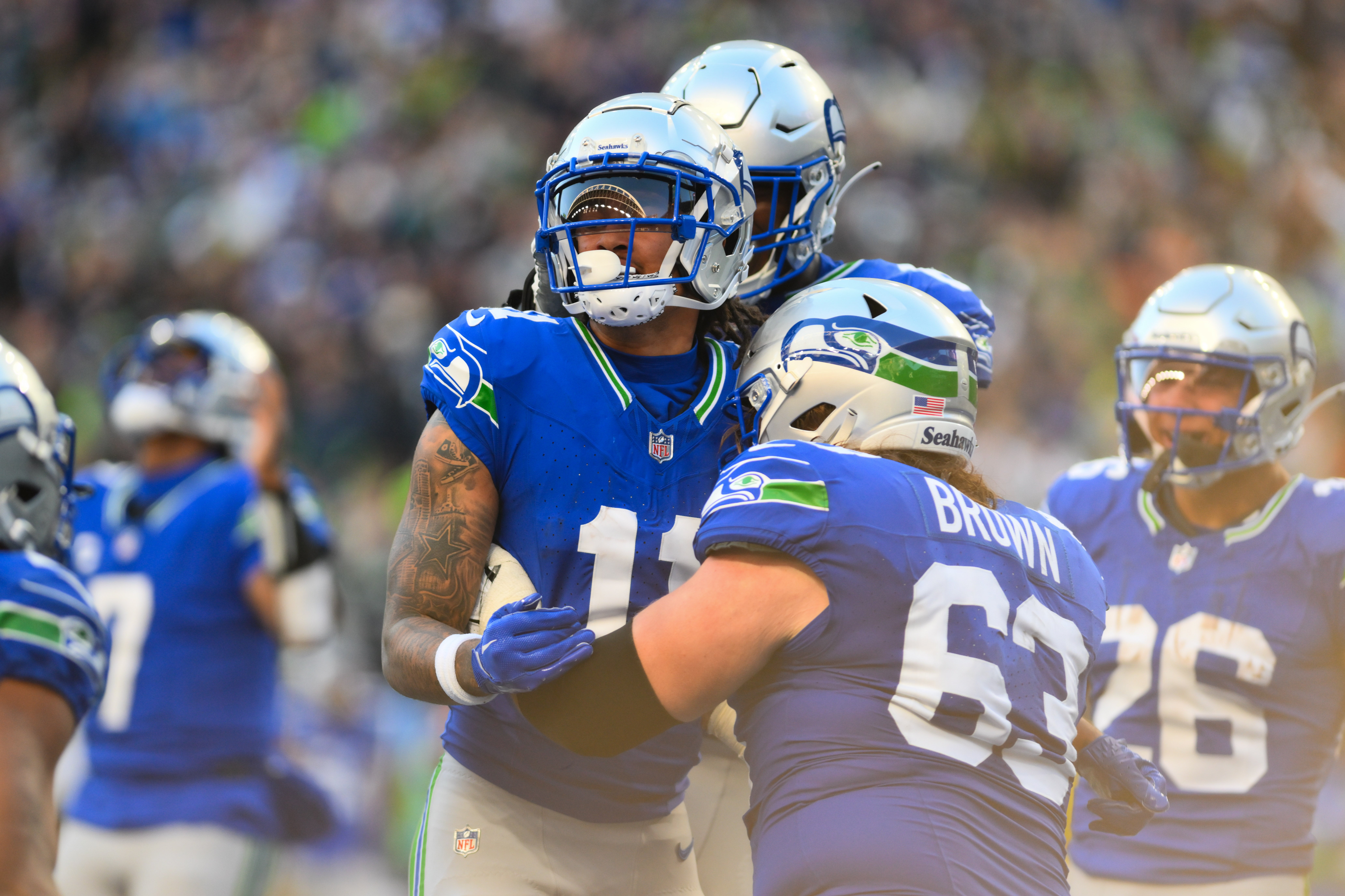Oct 29, 2023; Seattle, Washington, USA; Seattle Seahawks wide receiver Jaxon Smith-Njigba (11) celebrates after scoring a touchdown against the Cleveland Browns during the second half at Lumen Field. Mandatory Credit: Steven Bisig-USA TODAY Sports