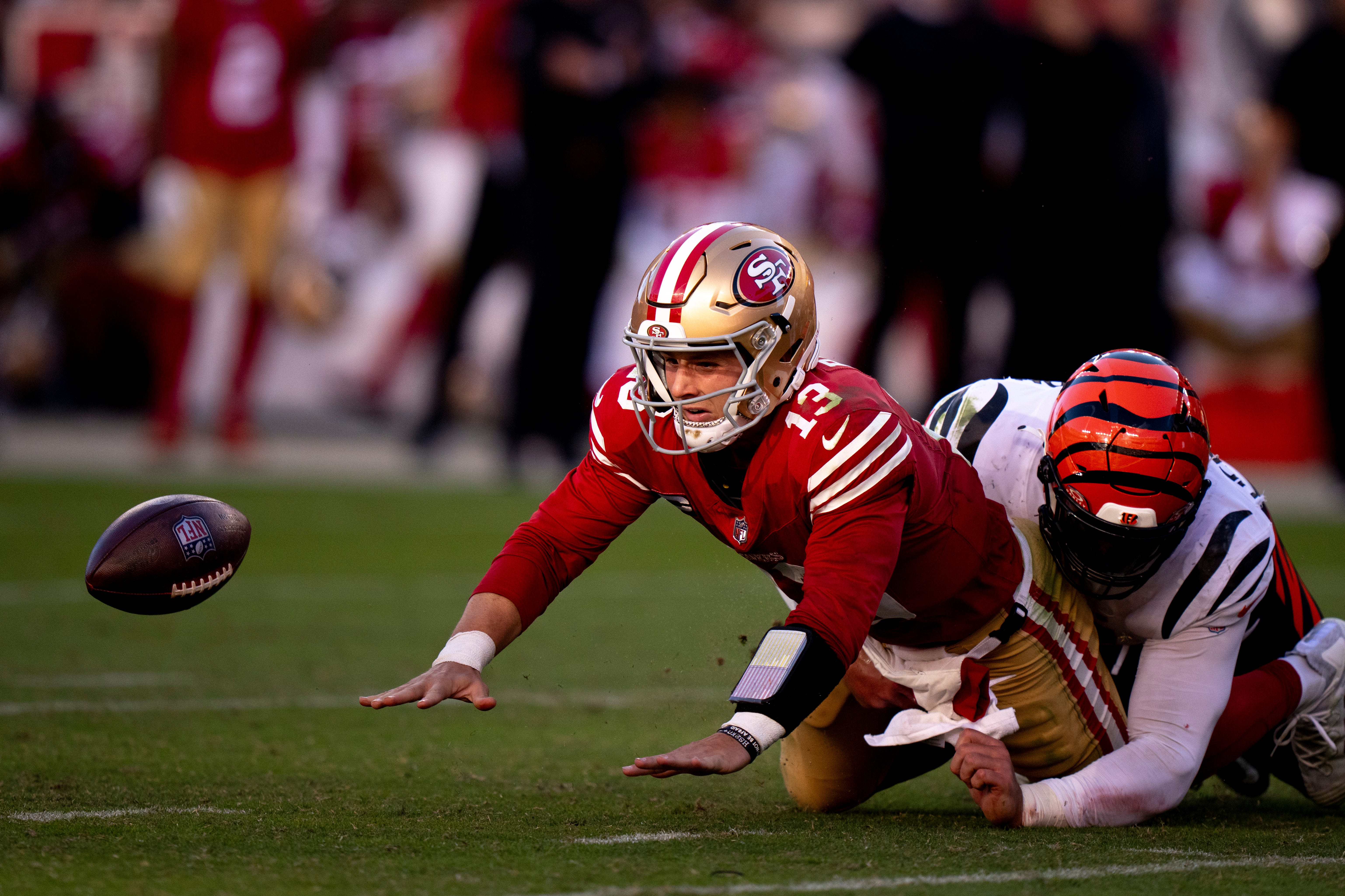 Cincinnati Bengals defensive end Trey Hendrickson (91) forces a fumble while sacking San Francisco 49ers quarterback Brock Purdy (13) in the fourth quarter of the NFL game between the Cincinnati Bengals and the San Francisco 49ers at Levi Stadium in Santa Clara, Calif., on Sunday, Oct 29, 2023.