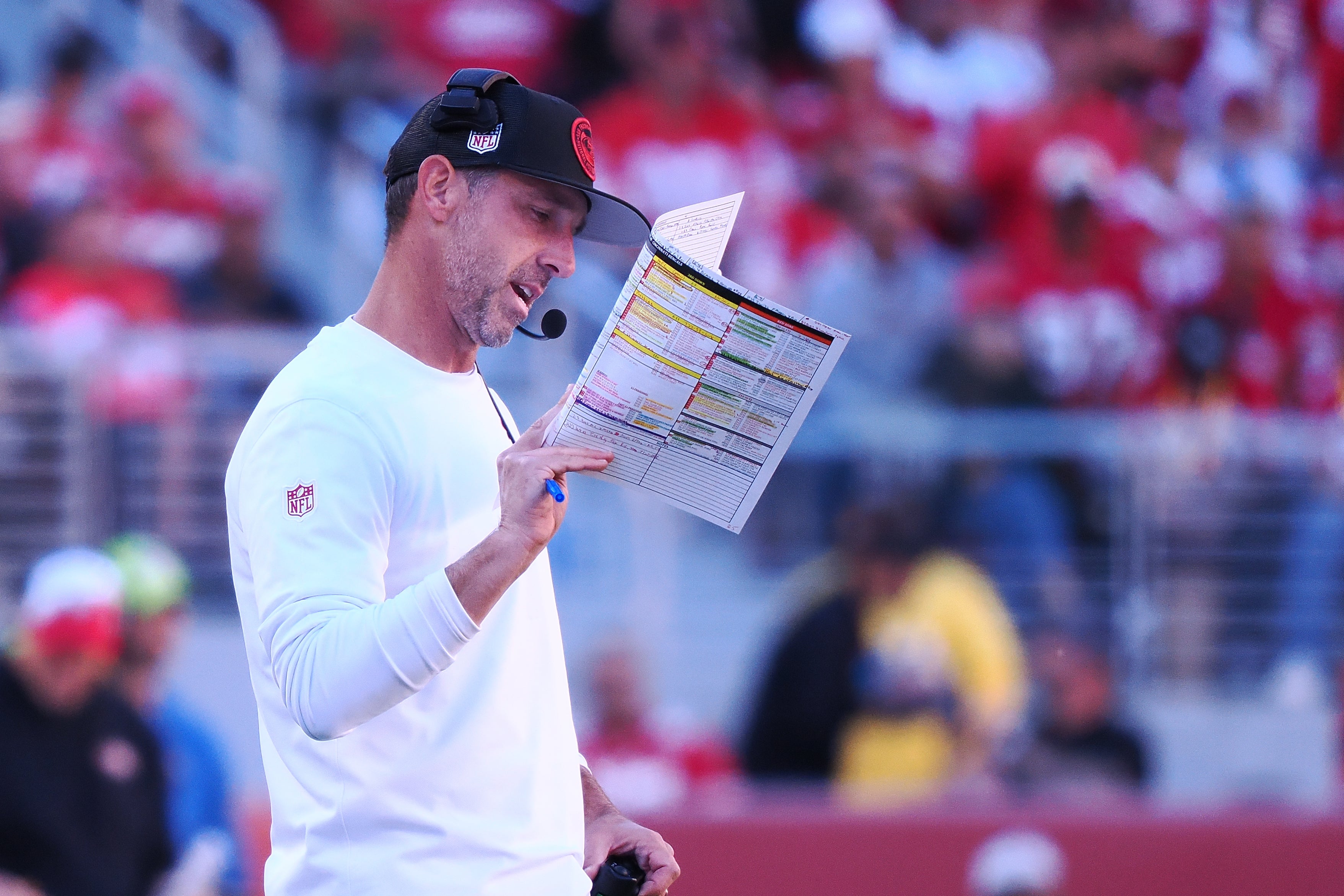 Oct 29, 2023; Santa Clara, California, USA; San Francisco 49ers head coach Kyle Shanahan looks at the play card during the third quarter against the Cincinnati Bengals at Levi's Stadium.
