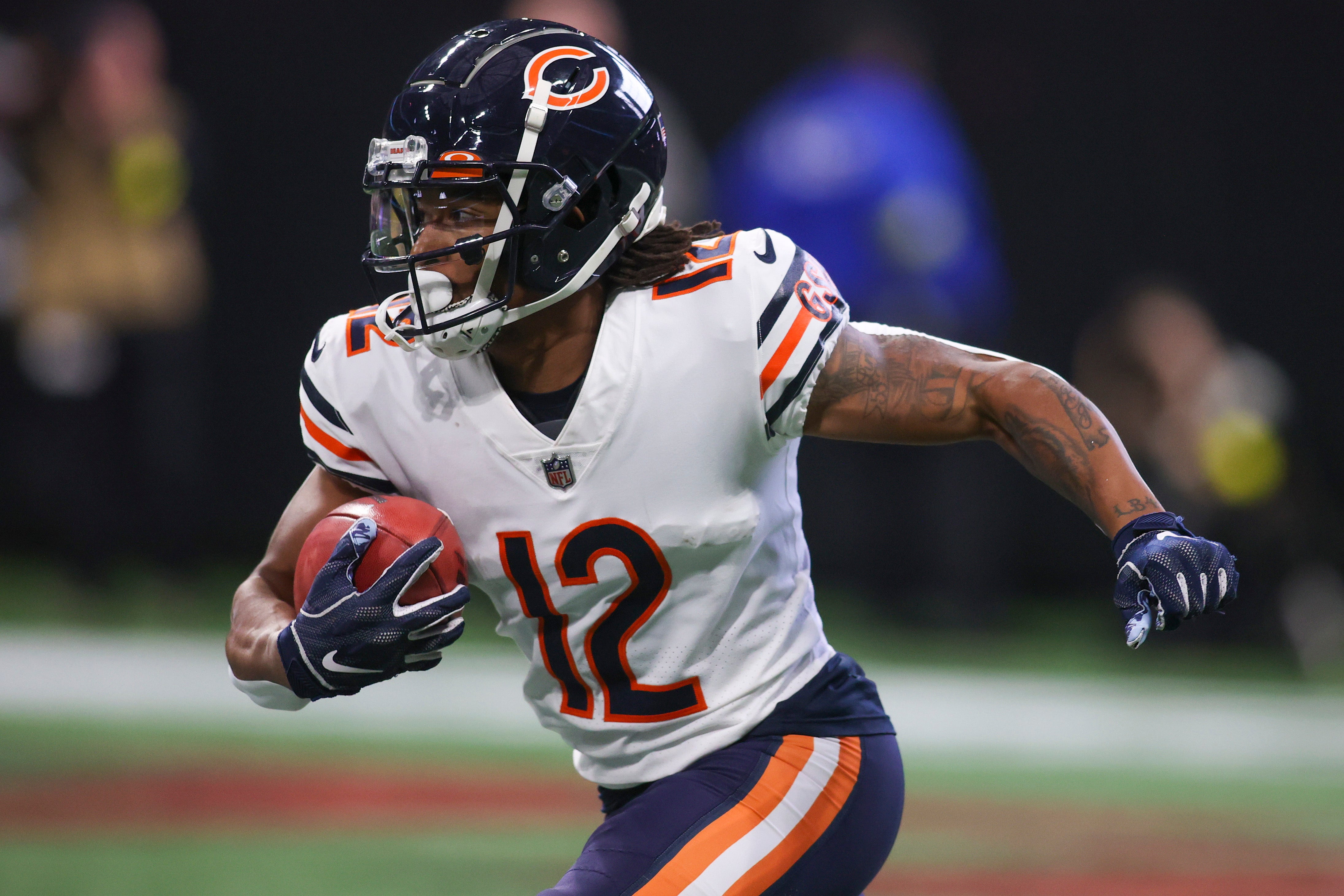 Nov 20, 2022; Atlanta, Georgia, USA; Chicago Bears wide receiver Velus Jones Jr. (12) returns a kick against the Atlanta Falcons in the first quarter at Mercedes-Benz Stadium.