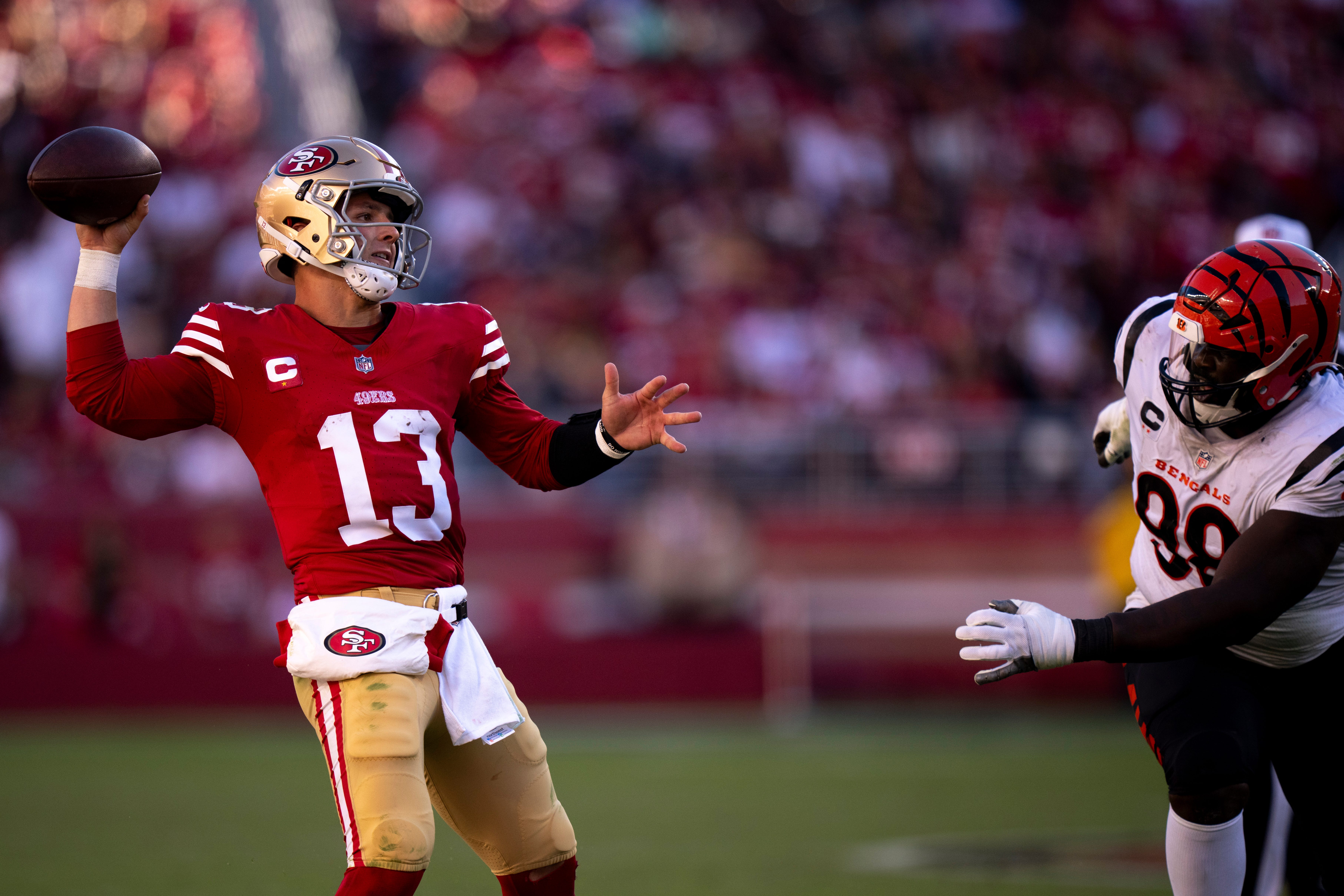 San Francisco 49ers quarterback Brock Purdy (13) throws as Cincinnati Bengals defensive tackle DJ Reader (98) pressures him in the fourth quarter of the NFL game between the Cincinnati Bengals and the San Francisco 49ers at Levi Stadium in Santa Clara, Calif., on Sunday, Oct 29, 2023.
