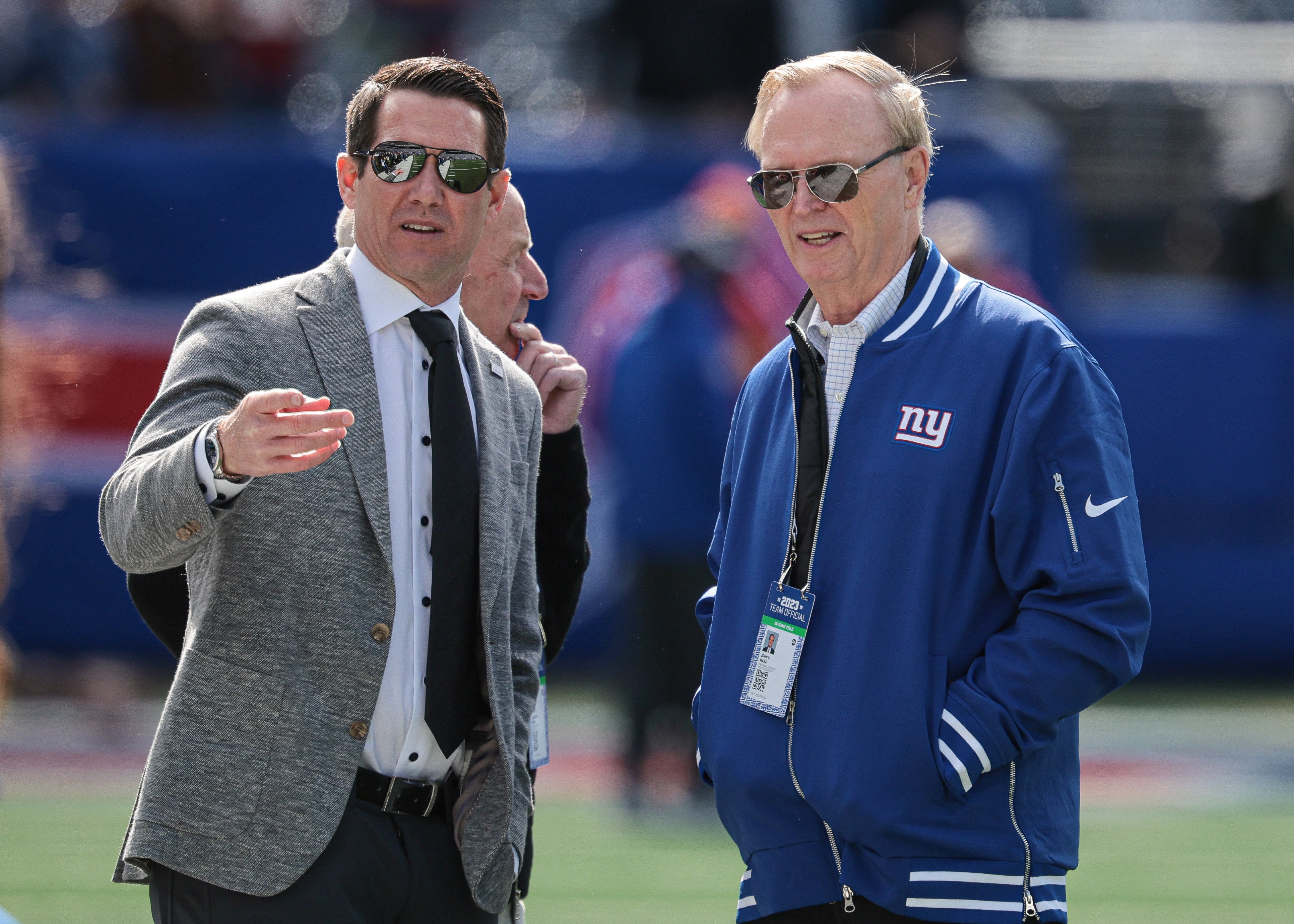 New York Giants general manager Joe Schoen (left) talks with president and CEO John Mara (right) before the game against the Washington Commanders at MetLife Stadium.