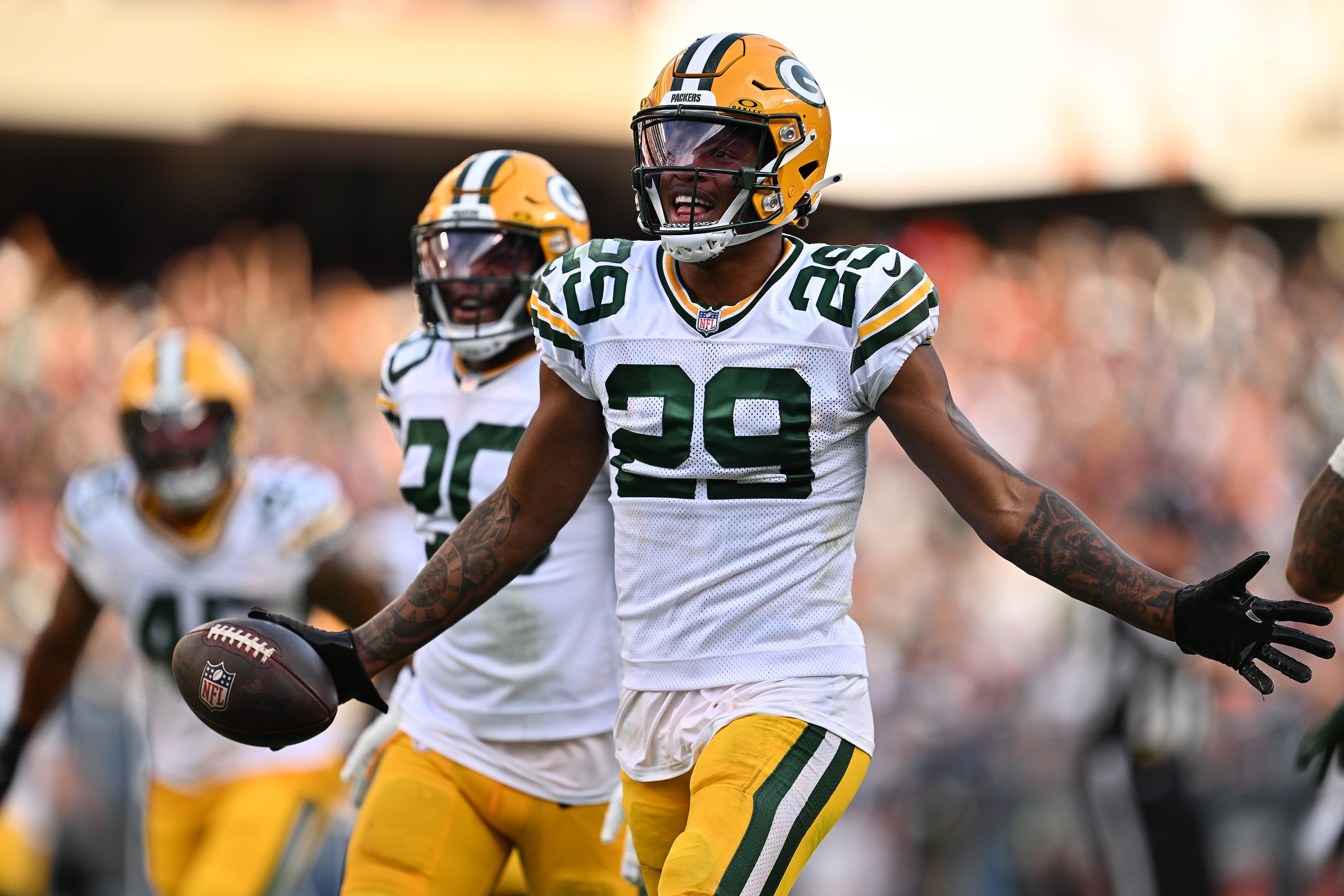Sep 10, 2023; Chicago, Illinois, USA; Green Bay Packers cornerback Rasul Douglas (29) celebrates after receiving a fumble in the second half against the Chicago Bears at Soldier Field.