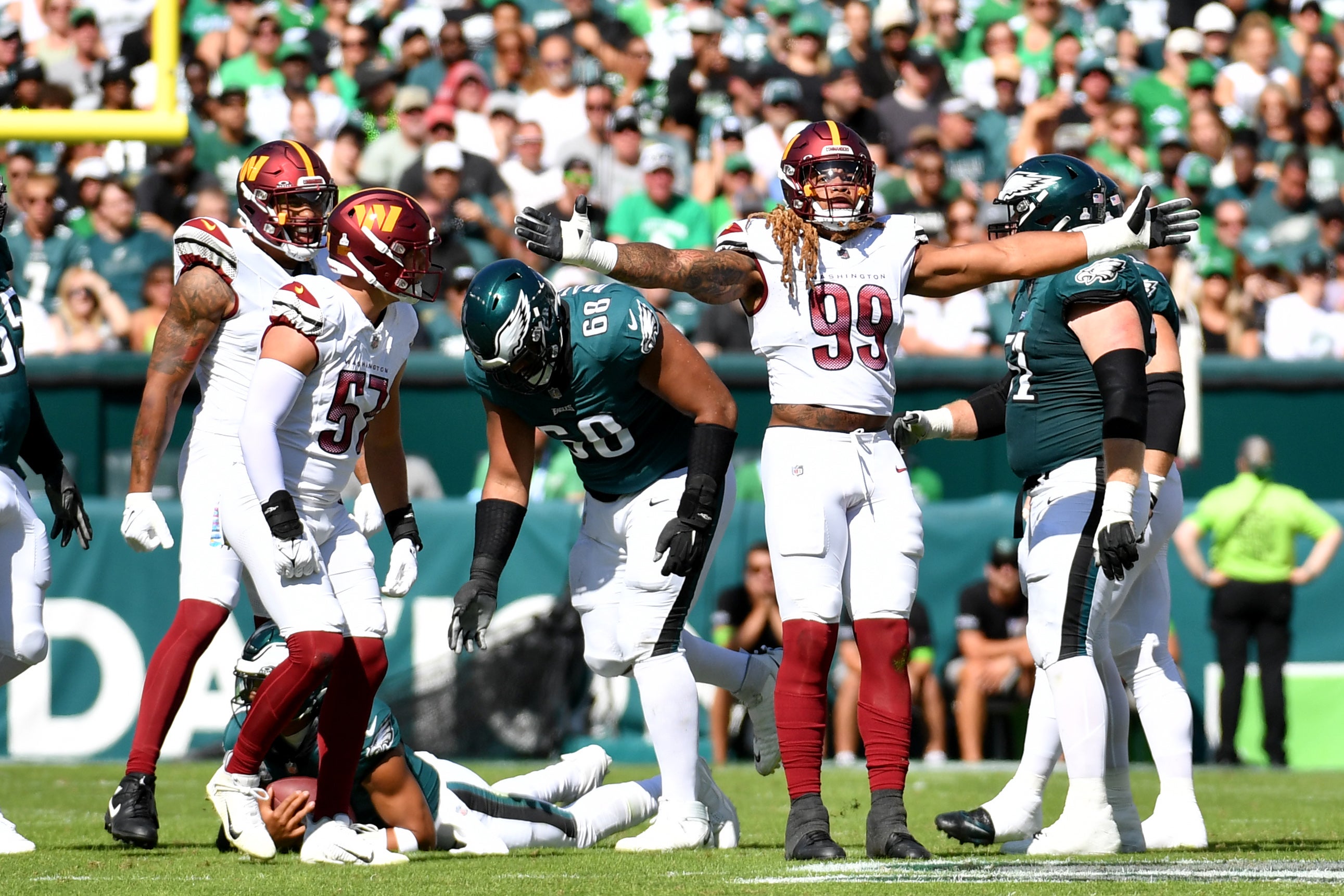 Oct 1, 2023; Philadelphia, Pennsylvania, USA; Washington Commanders defensive end Chase Young (99) celebrates his sack against the Philadelphia Eagles during the second quarter at Lincoln Financial Field.