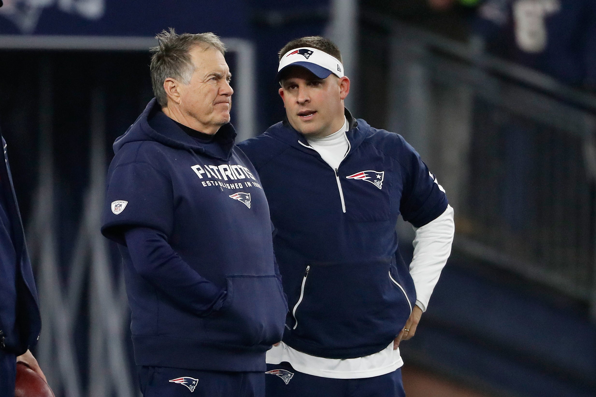 New England Patriots head coach Bill Belichick and former offensive coordinator Josh McDaniels