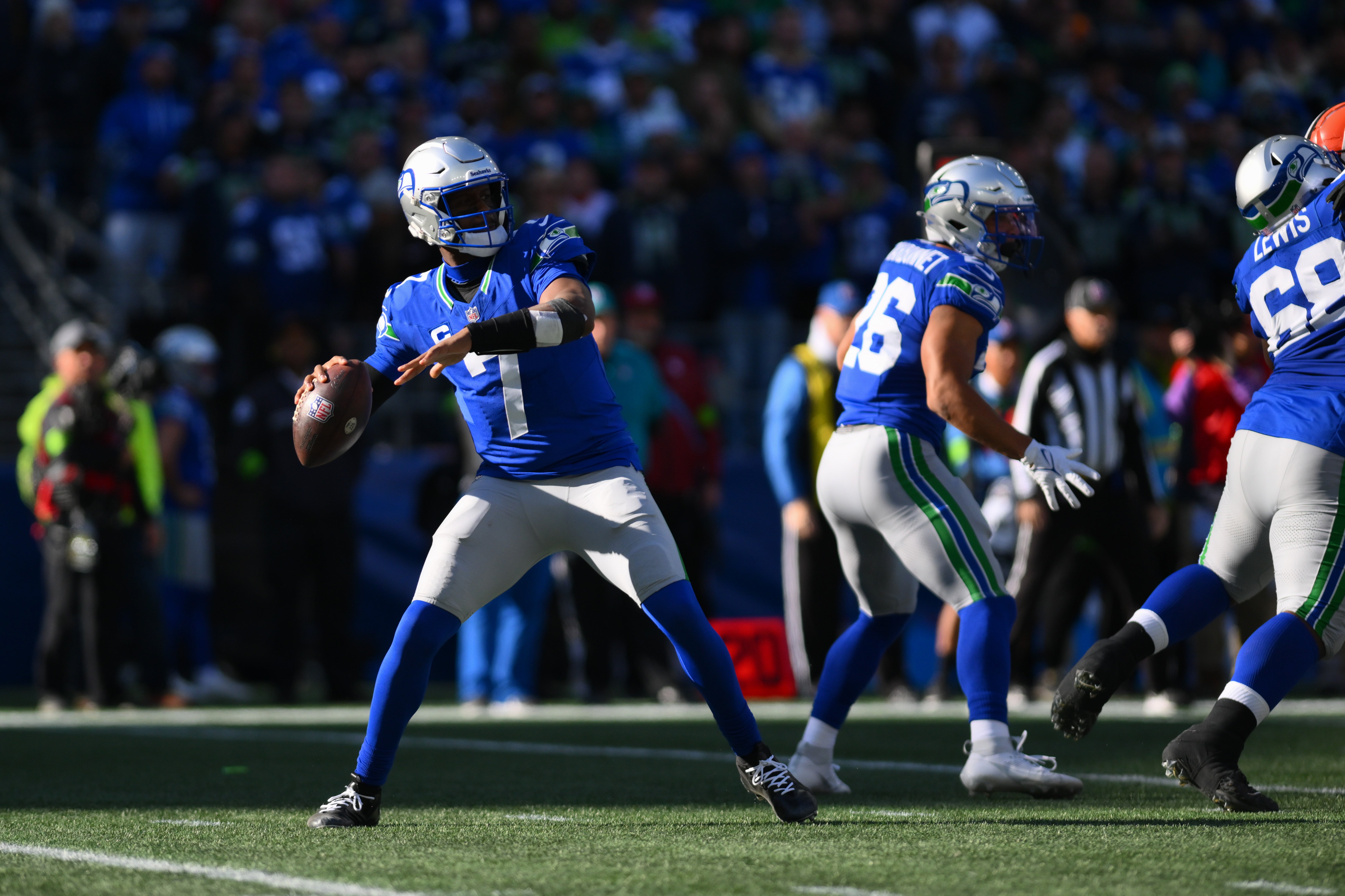 Oct 29, 2023; Seattle, Washington, USA; Seattle Seahawks quarterback Geno Smith (7) passes the ball against the Cleveland Browns during the first half at Lumen Field. Mandatory Credit: Steven Bisig-USA TODAY Sports
