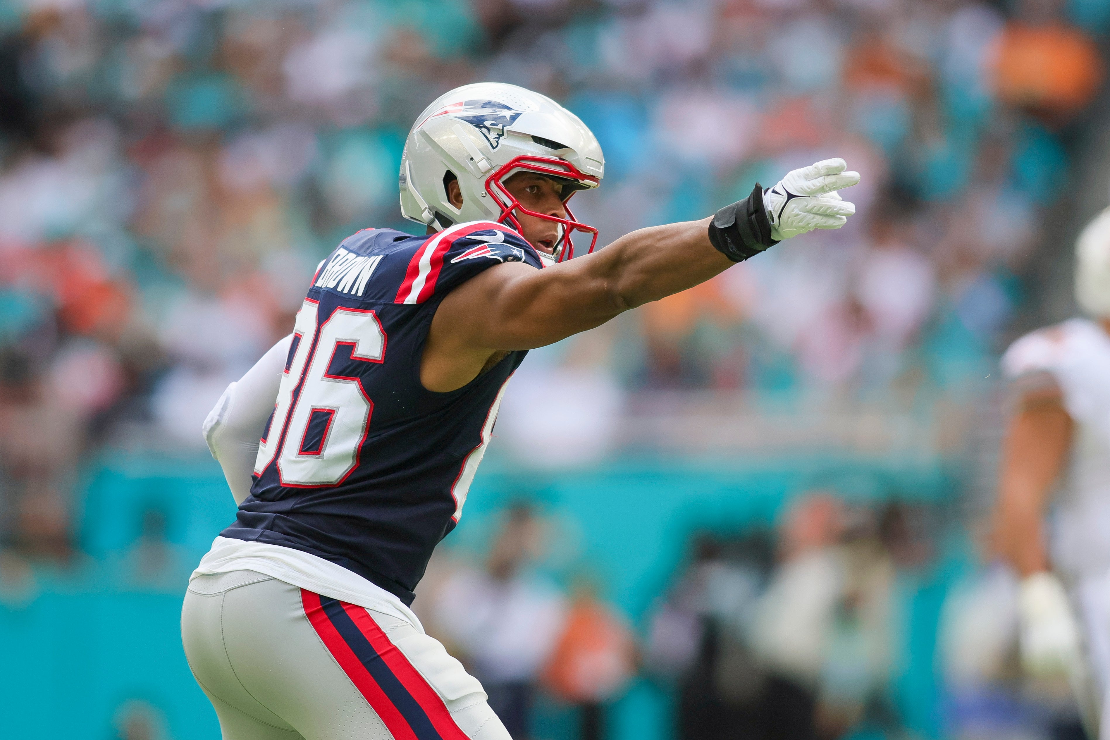 Patriots tight end Pharaoh Brown reacts after running with the football against the Miami Dolphins
