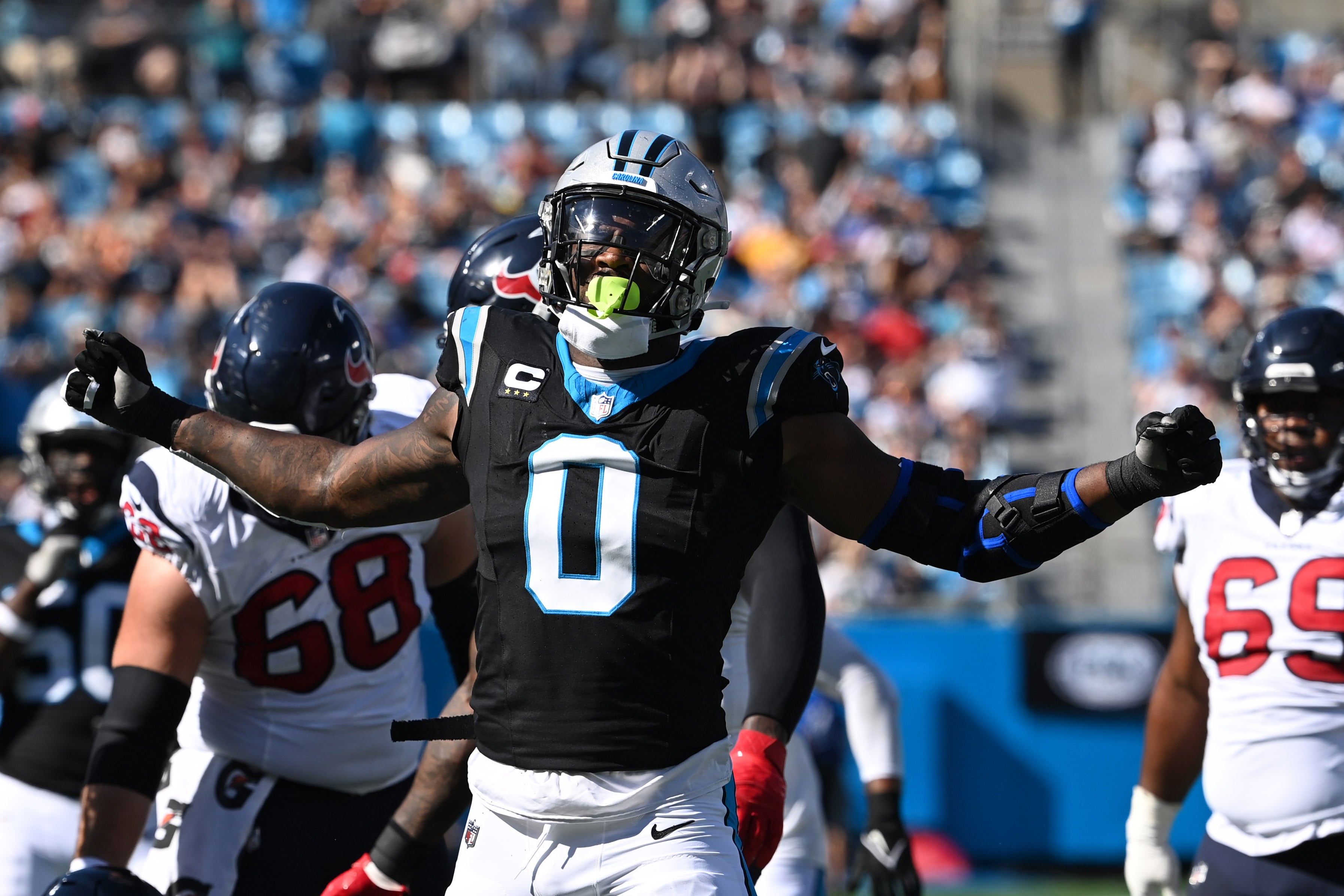 Oct 29, 2023; Charlotte, North Carolina, USA; Carolina Panthers linebacker Brian Burns (0) react after a sack in the second quarter at Bank of America Stadium. Mandatory Credit: Bob Donnan-USA TODAY Sports