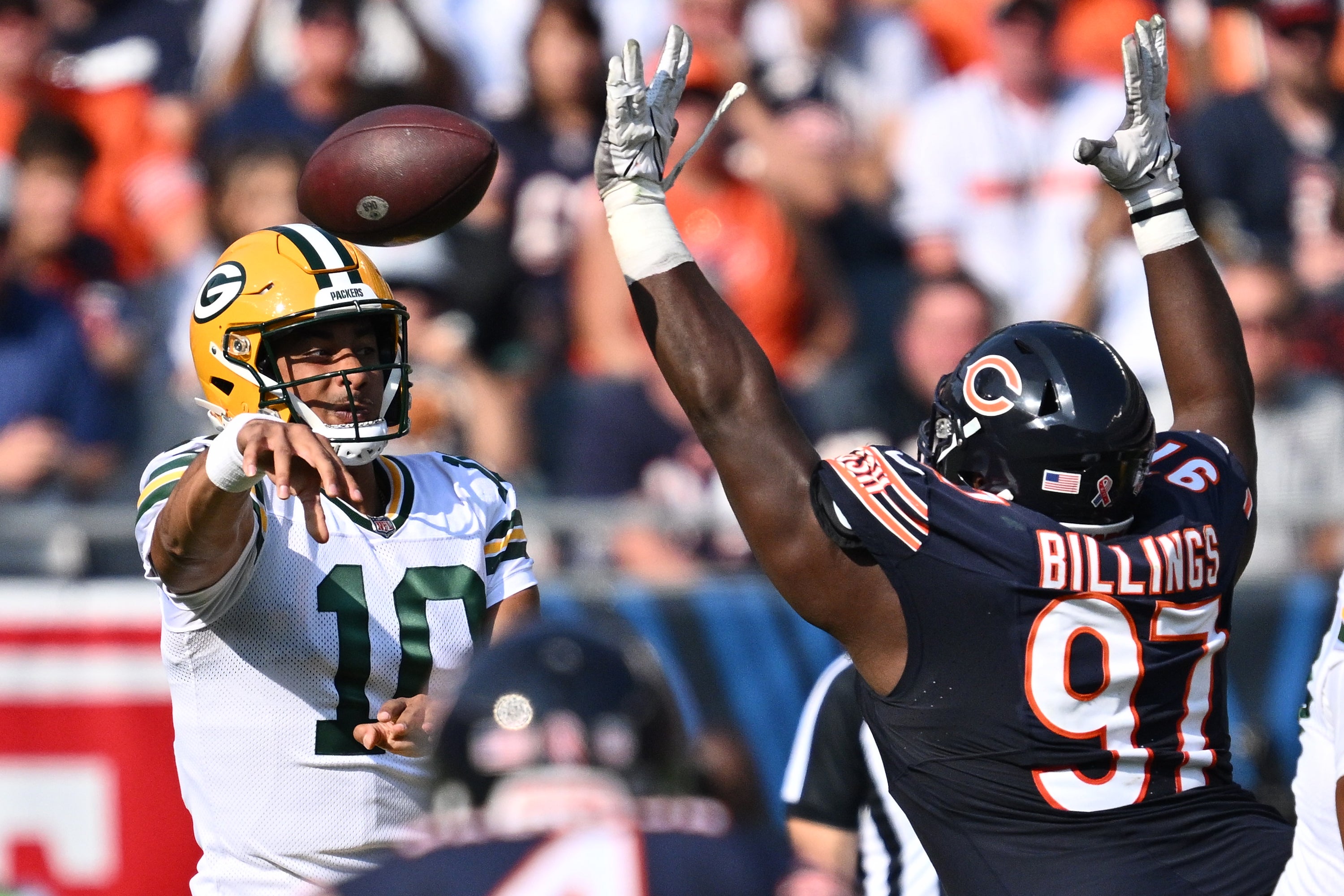 Sep 10, 2023; Chicago, Illinois, USA; Green Bay Packers quarterback Jordan Love (10) passes over the defense of Chicago Bears defensive lineman Andrew Billings (97) in the first half at Soldier Field.