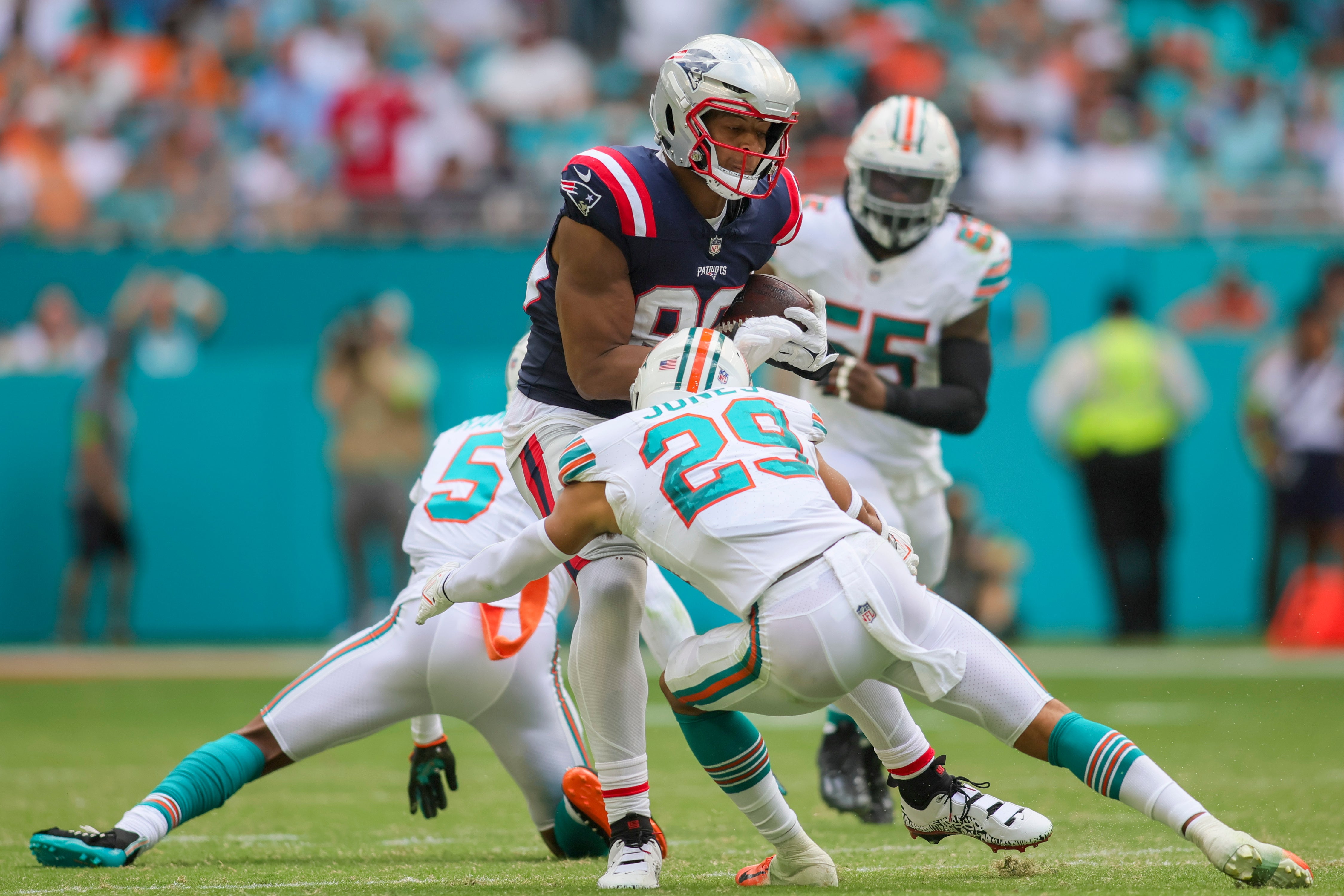 Pharaoh Brown runs with the football against the Miami Dolphins