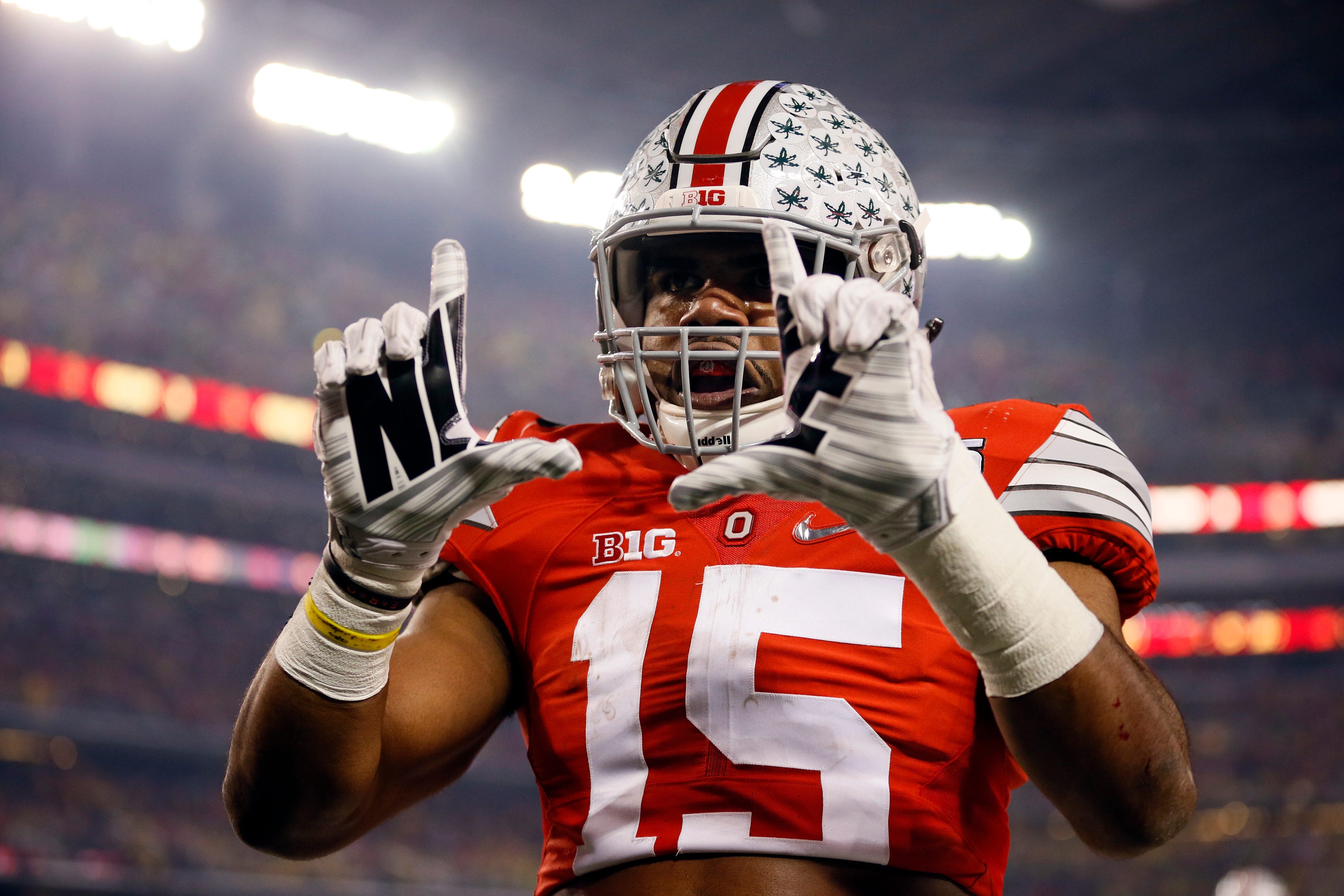 Ohio State Buckeyes running back Ezekiel Elliott  celebrates scoring a touchdown during the College Football Playoff National Championship in 2015