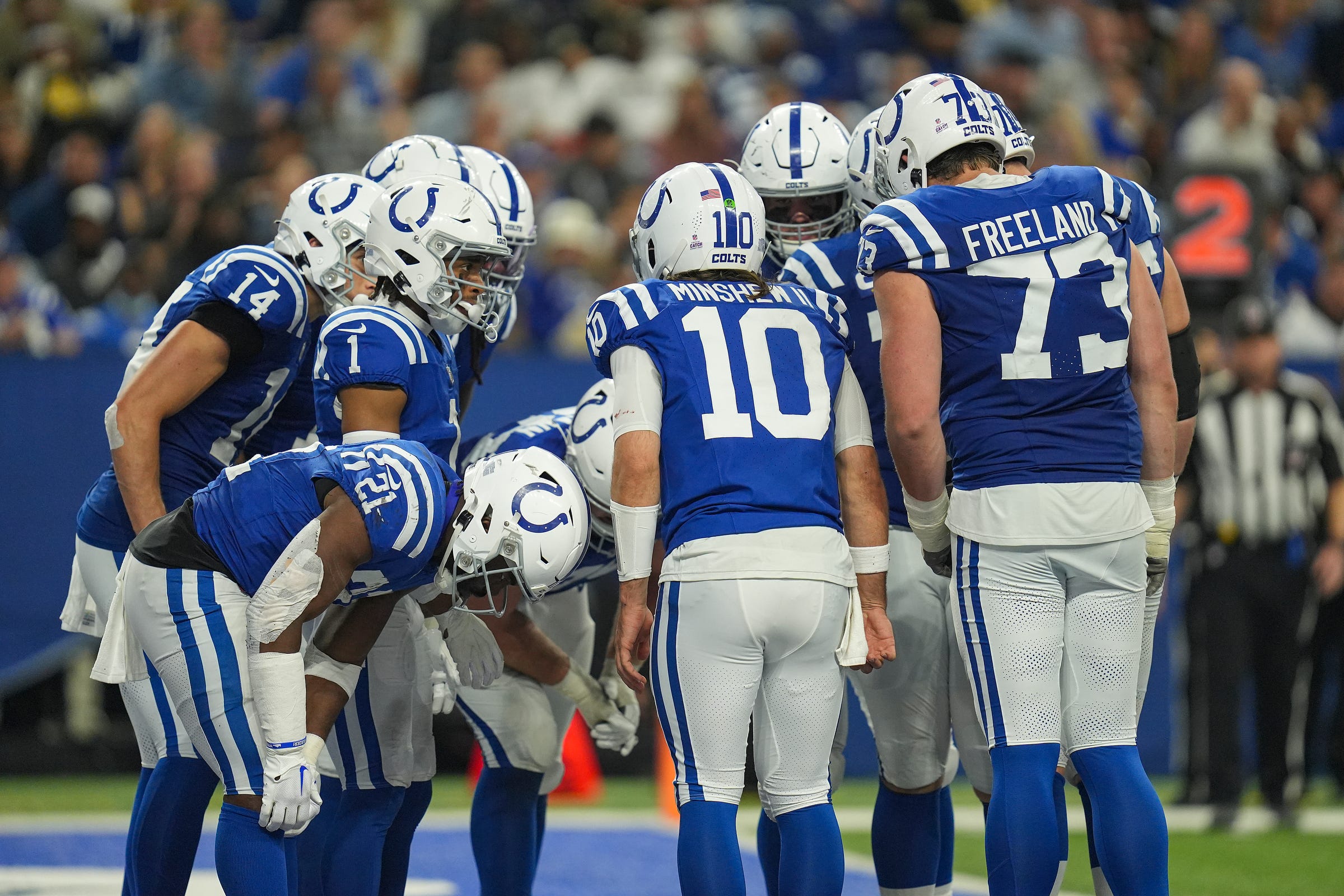 The Indianapolis Colts offensive line prepares for a possession on Sunday, Oct. 29, 2023, at Lucas Oil Stadium in Indianapolis. The Colts lost to the Saints, 38-27.