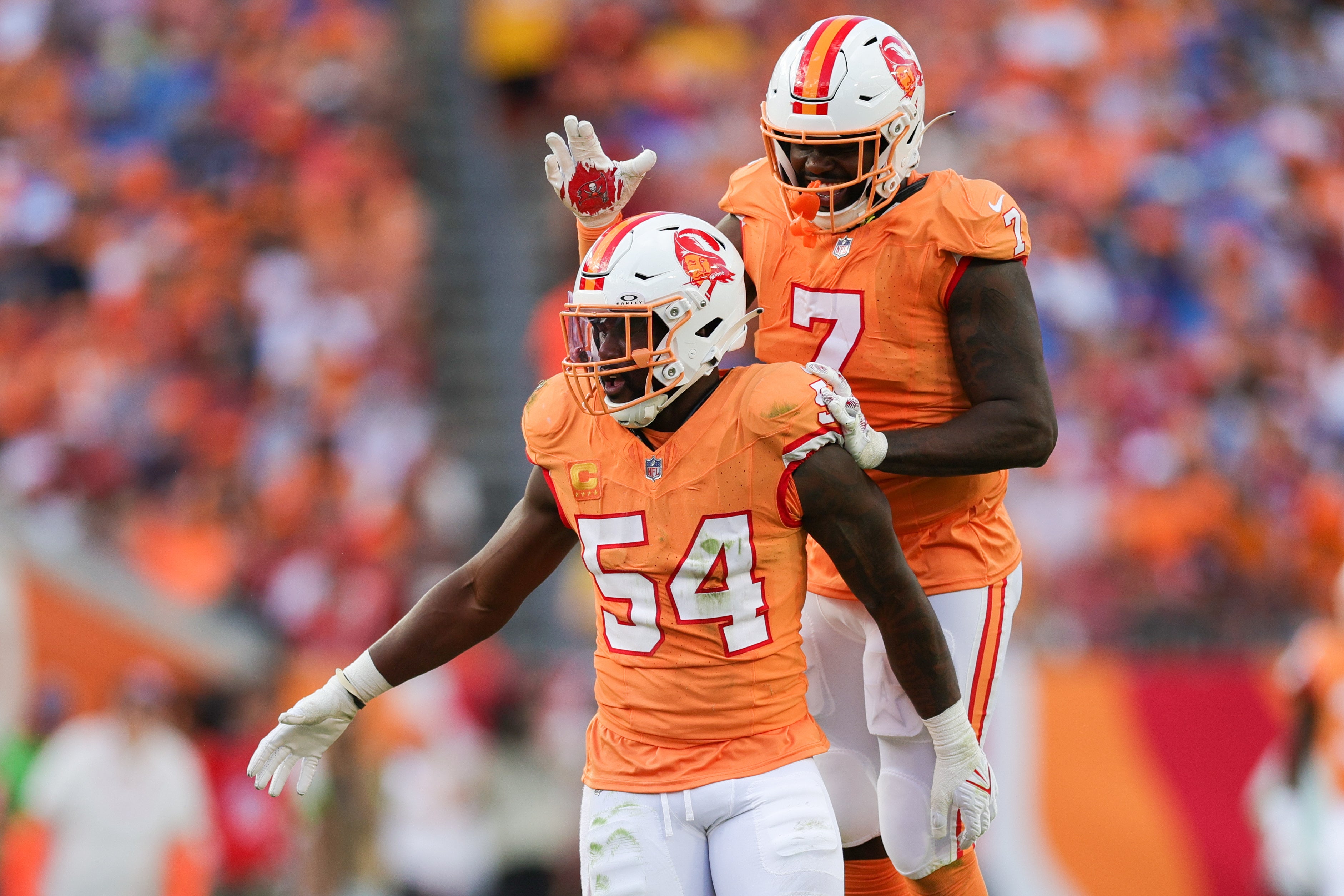 Oct 15, 2023; Tampa, Florida, USA; Tampa Bay Buccaneers linebacker Lavonte David (54) celebrates with linebacker Shaquil Barrett (7) after sacking Detroit Lions quarterback Jared Goff (16) (not pictured) in the second quarter at Raymond James Stadium. Mandatory Credit: Nathan Ray Seebeck-USA TODAY Sports