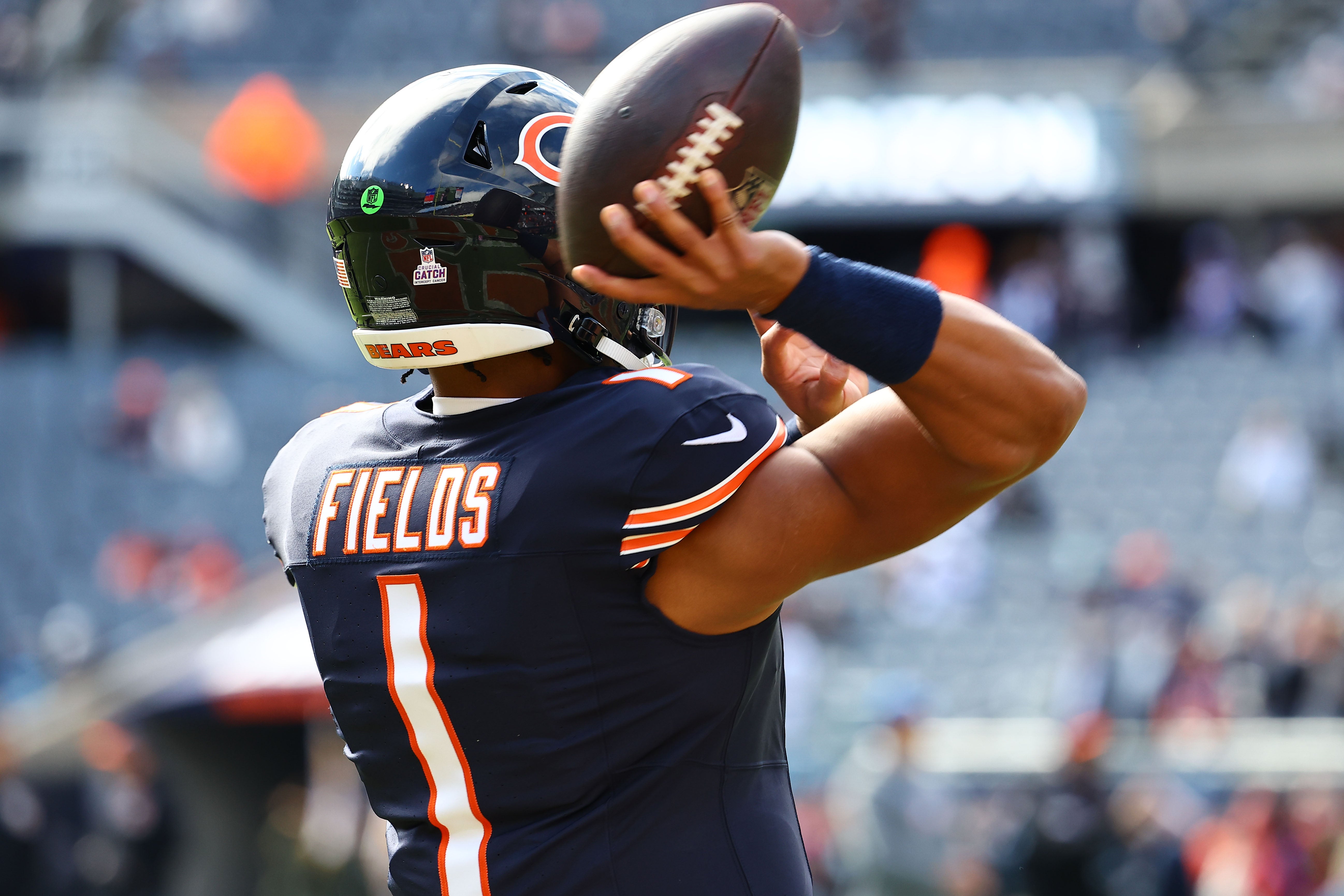 Oct 15, 2023; Chicago, Illinois, USA; Chicago Bears quarterback Justin Fields (1) practices before the game against the Minnesota Vikings at Soldier Field.