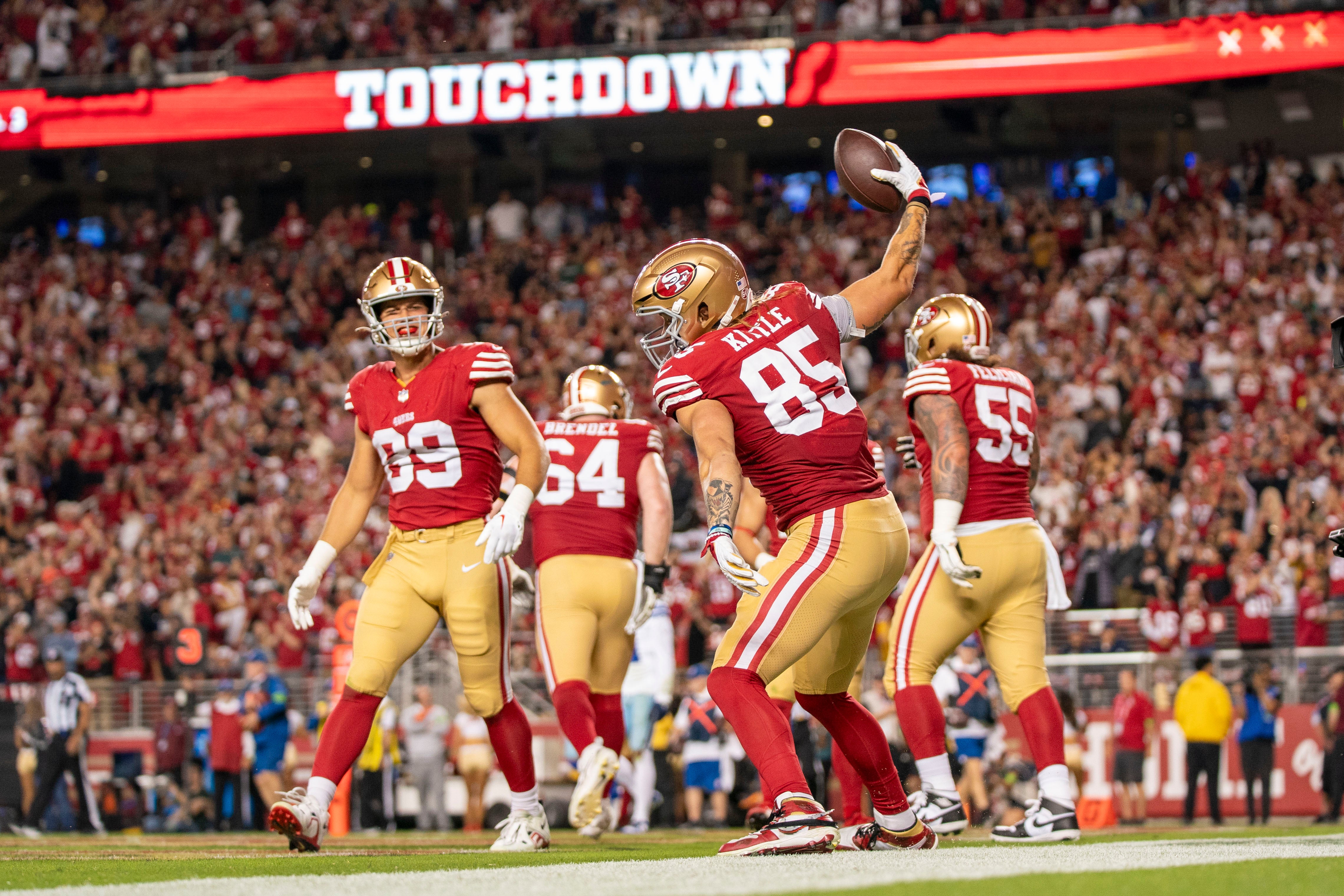 October 8, 2023; Santa Clara, California, USA; San Francisco 49ers tight end George Kittle (85) celebrates after scoring a touchdown against the Dallas Cowboys during the third quarter at Levi's Stadium.