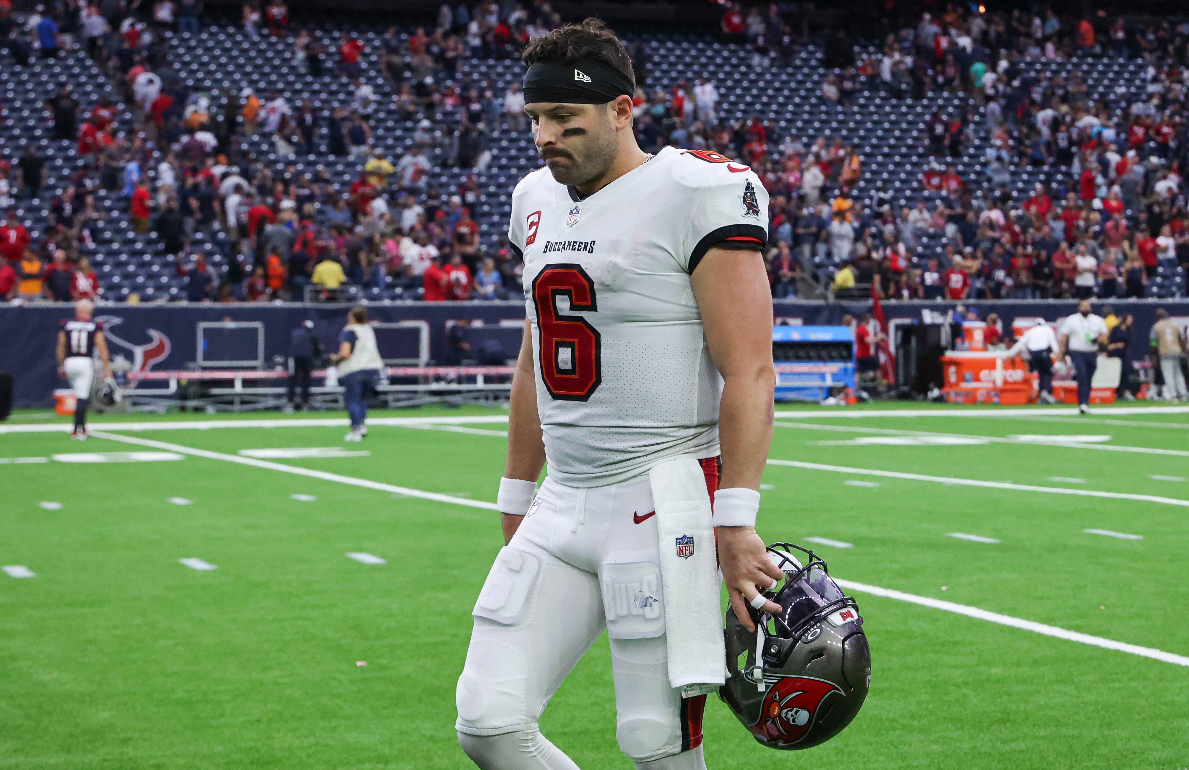 Nov 5, 2023; Houston, Texas, USA; Tampa Bay Buccaneers quarterback Baker Mayfield (6) walks off the field after the game against the Houston Texans at NRG Stadium. Mandatory Credit: Troy Taormina-USA TODAY Sports