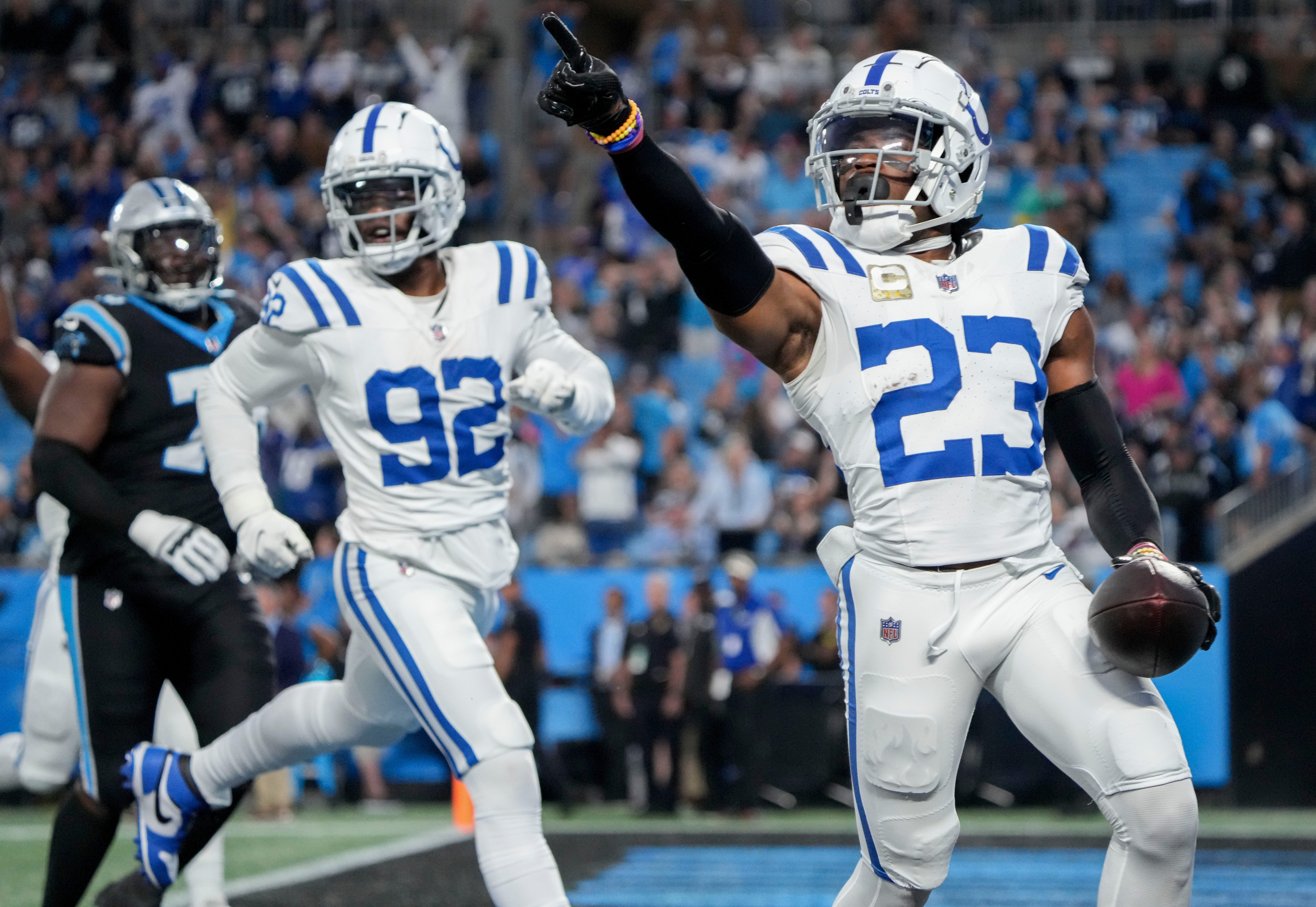 Indianapolis Colts cornerback Kenny Moore II (23) runs 49 yards for a touchdown after intercepting a pass by Carolina Panthers quarterback Bryce Young (9) on Sunday, Nov. 5, 2023, during a game against the Carolina Panthers at Bank of America Stadium in Charlotte.