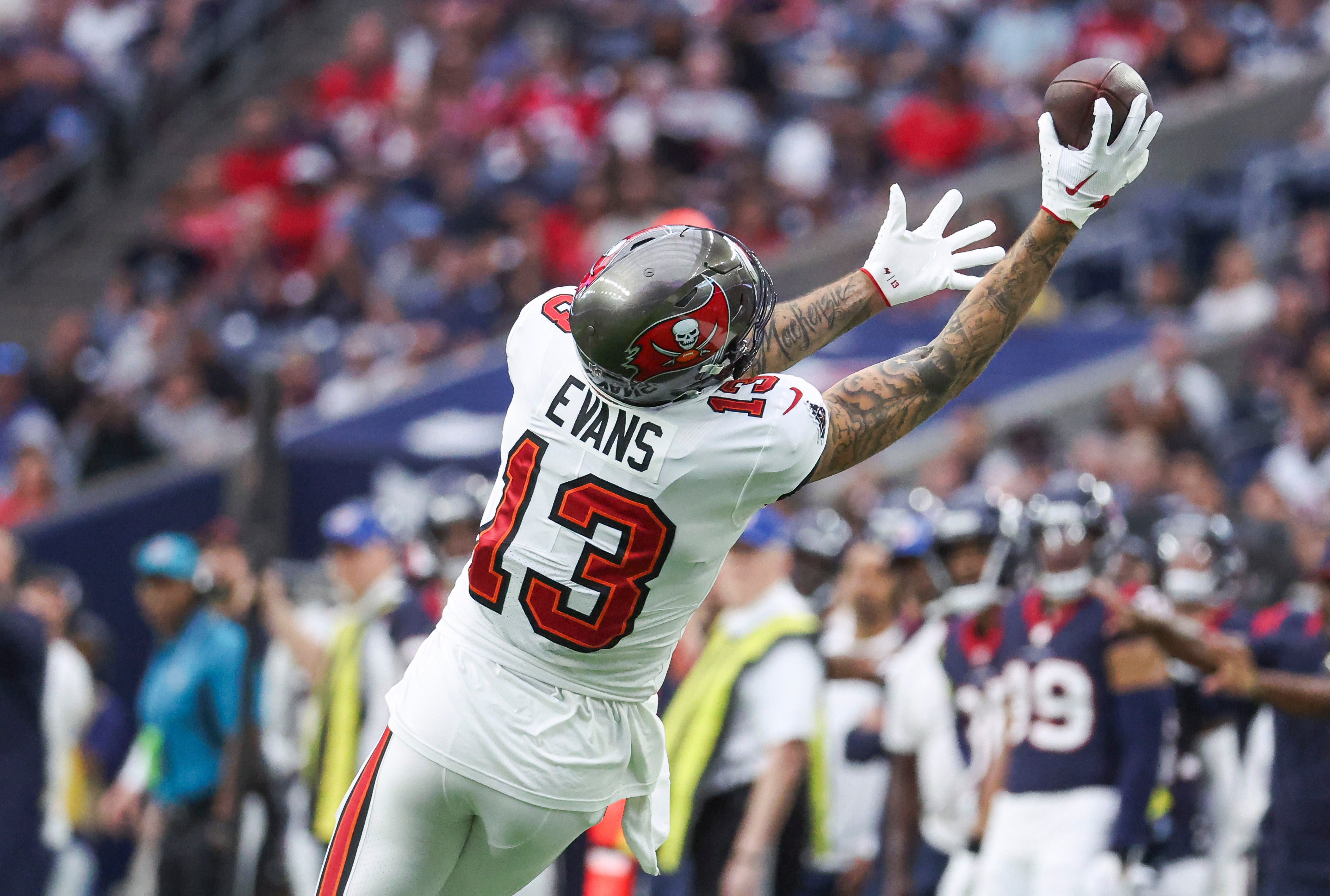 Nov 5, 2023; Houston, Texas, USA; Tampa Bay Buccaneers wide receiver Mike Evans (13) attempts to make a reception during the first quarter against the Houston Texans at NRG Stadium. Mandatory Credit: Troy Taormina-USA TODAY Sports