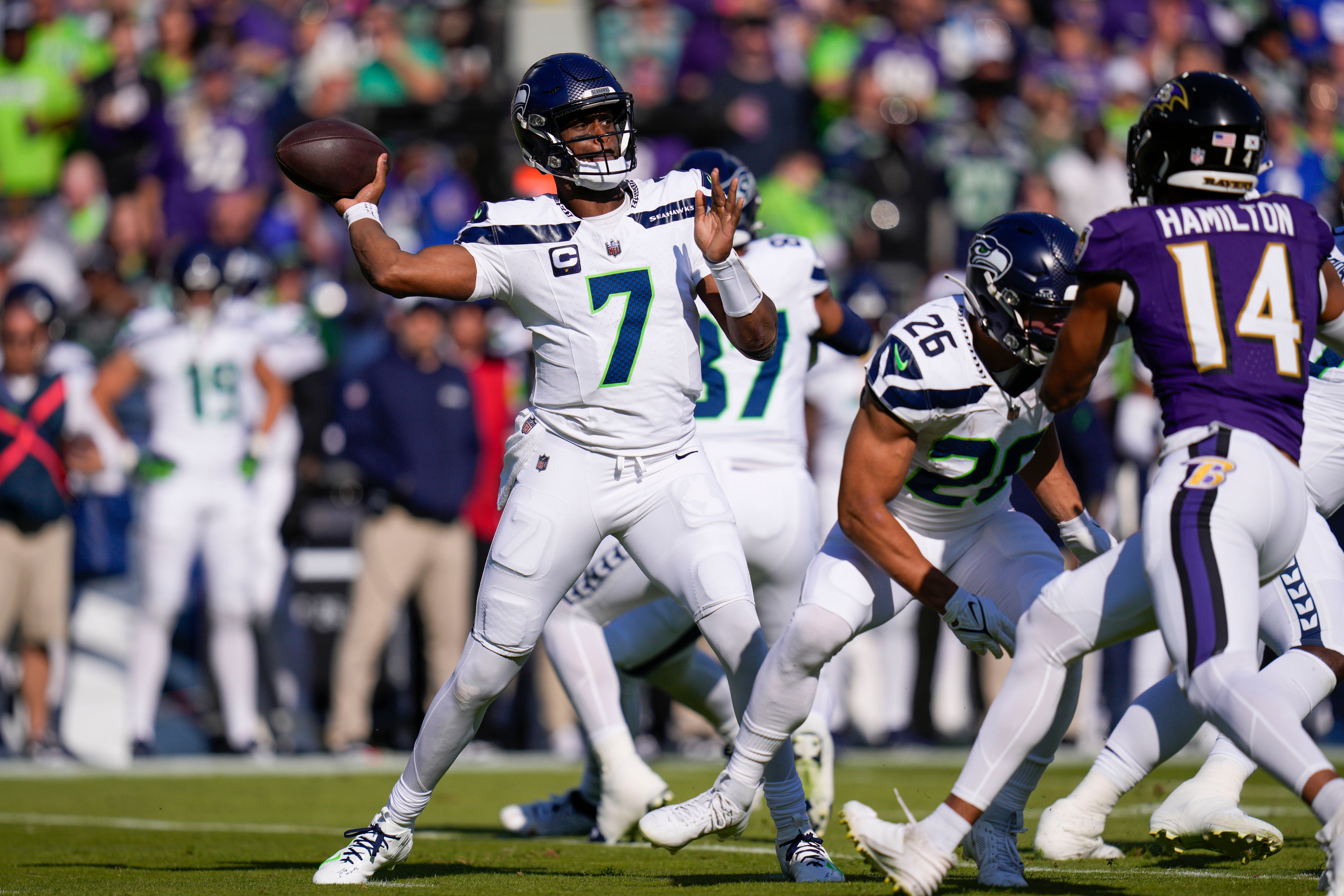 Nov 5, 2023; Baltimore, Maryland, USA; Seattle Seahawks quarterback Geno Smith (7) passes against the Baltimore Ravens during the first quarter at M&T Bank Stadium. Mandatory Credit: Jessica Rapfogel-USA TODAY Sports
