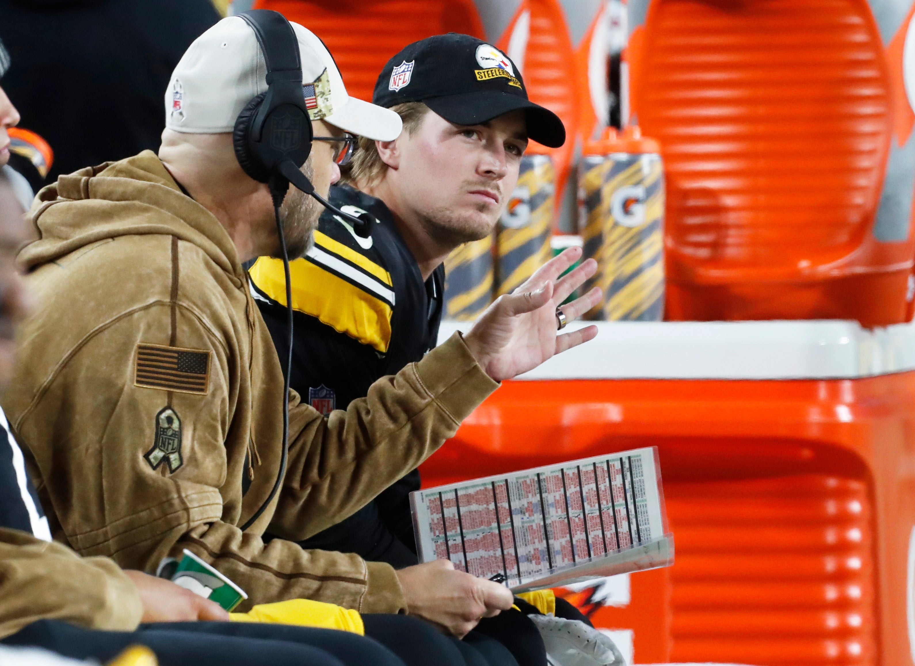 Nov 2, 2023; Pittsburgh, Pennsylvania, USA; Pittsburgh Steelers offensive coordinator Matt Canada (left) talks to quarterback Kenny Pickett (8) on the sidelines against the Tennessee Titans during the second quarter at Acrisure Stadium. Mandatory Credit: Charles LeClaire-USA TODAY Sports