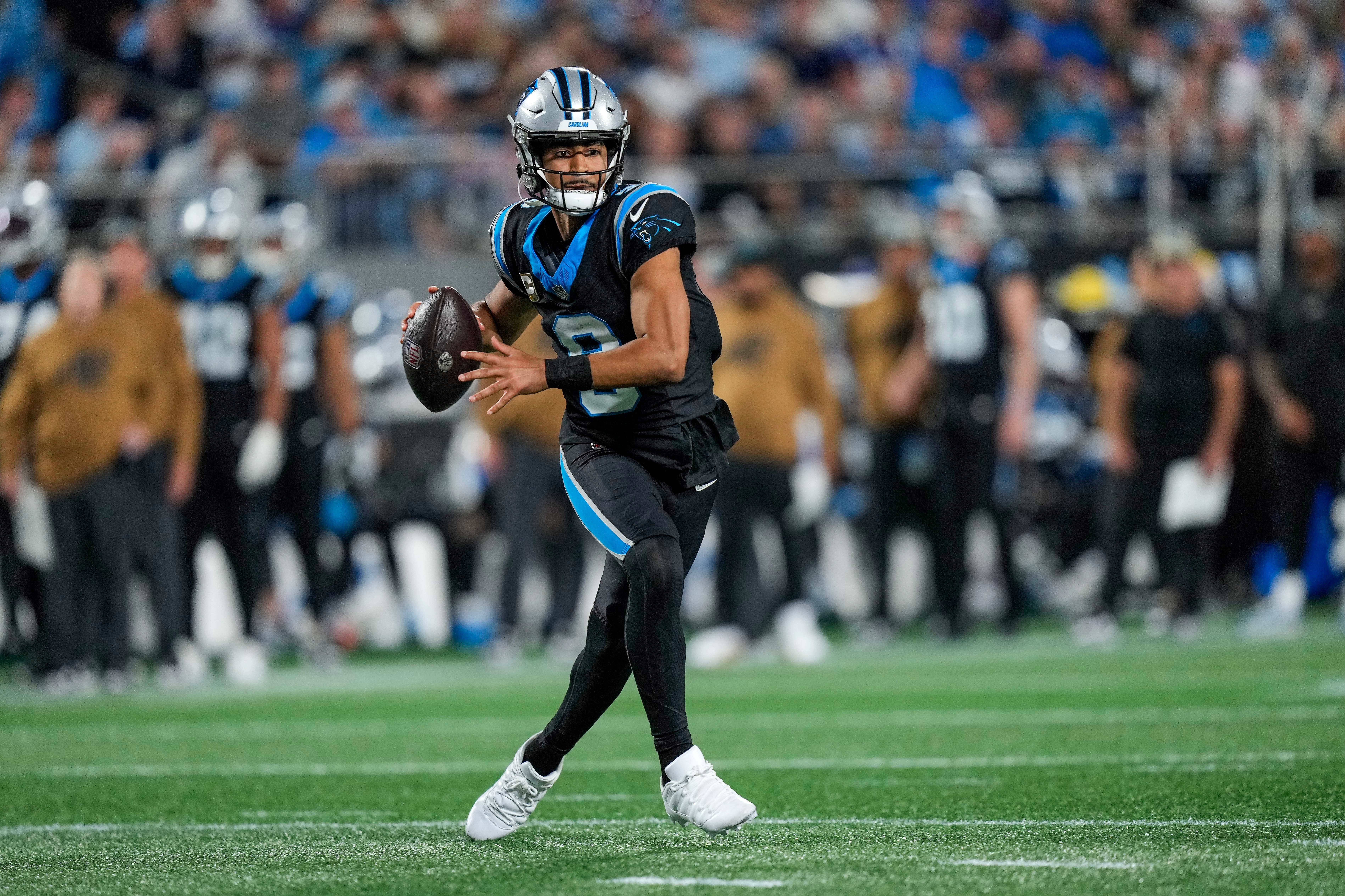 Nov 5, 2023; Charlotte, North Carolina, USA; Carolina Panthers quarterback Bryce Young (9) scrambles out of the pocket during the second half against the Indianapolis Colts at Bank of America Stadium. Mandatory Credit: Jim Dedmon-USA TODAY Sports