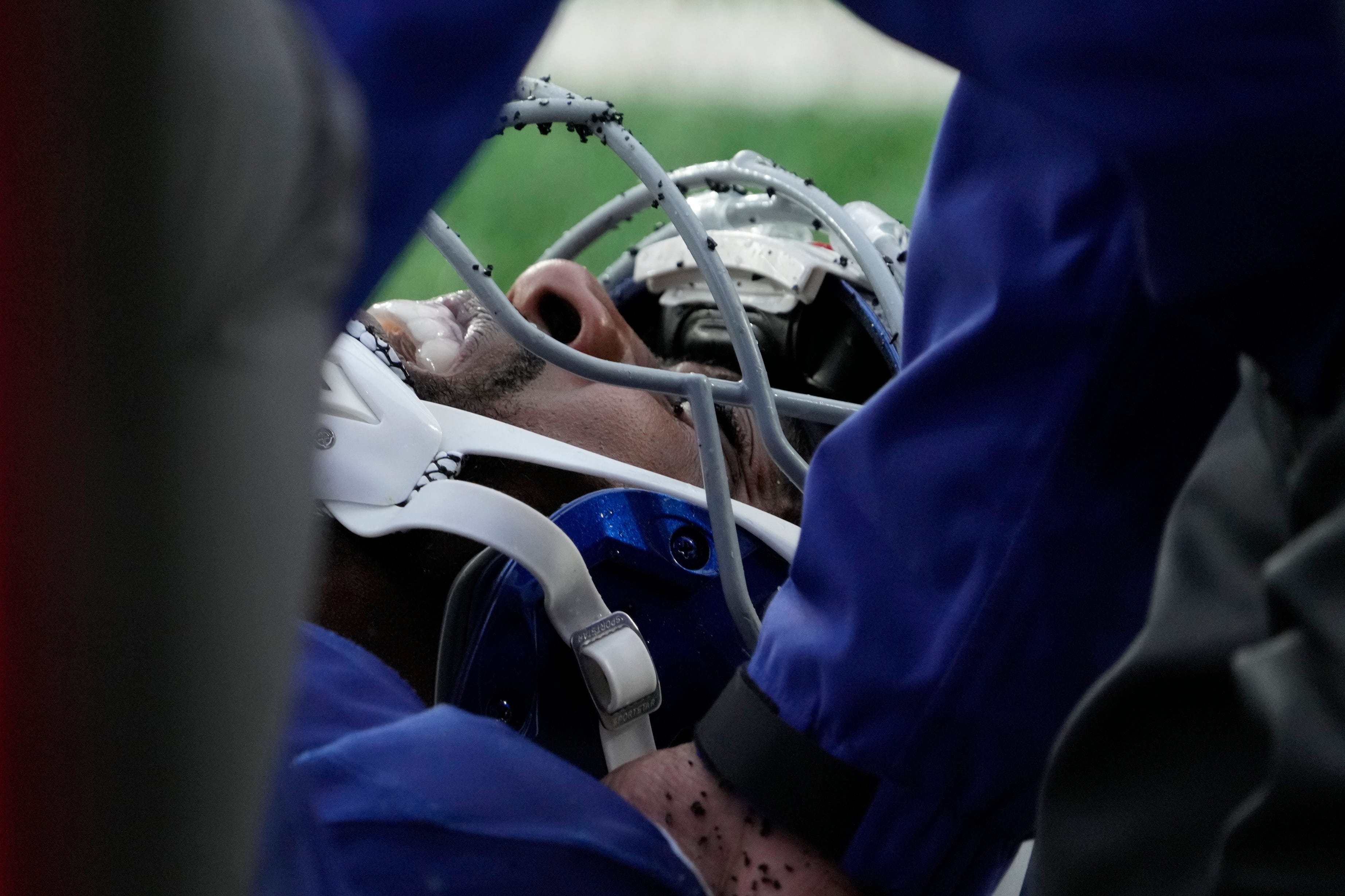 New York Giants quarterback Tyrod Taylor is in some pain after a play