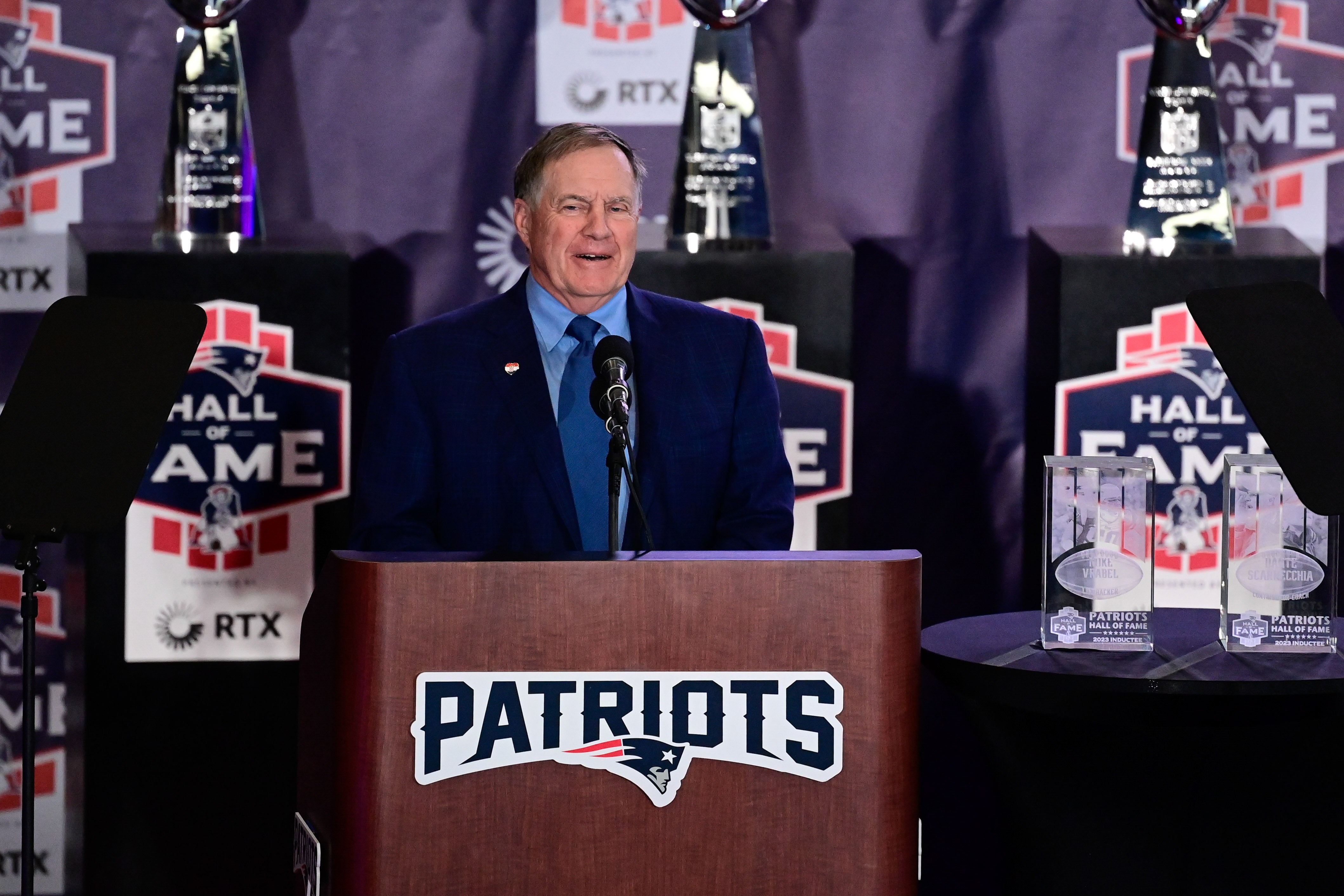 New England Patriots head coach Bill Belichick gives a speech at the 2023 Patriots Hall of Fame induction in the Cross Insurance Pavilion at Gillette Stadium
