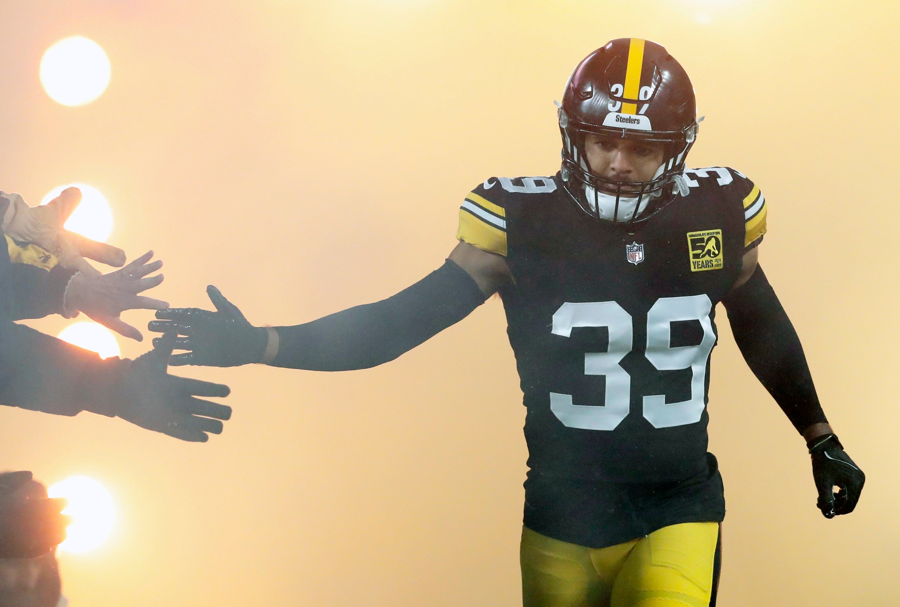 Dec 24, 2022; Pittsburgh, Pennsylvania, USA; Pittsburgh Steelers safety Minkah Fitzpatrick (39) greets fans as he takes the field against the Las Vegas Raiders during the first quarter at Acrisure Stadium. Mandatory Credit: Charles LeClaire-USA TODAY Sports