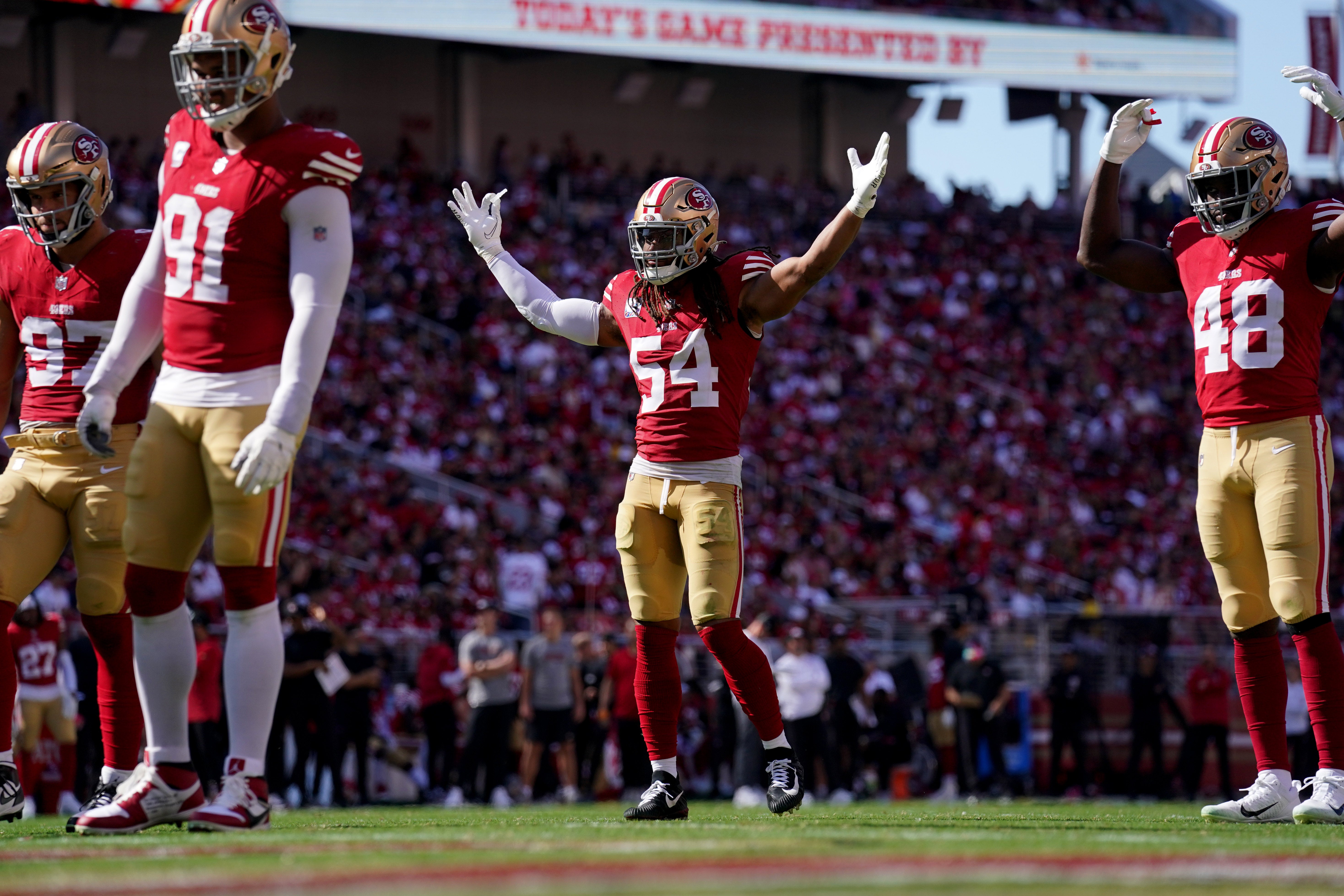 Oct 1, 2023; Santa Clara, California, USA; San Francisco 49ers linebacker Fred Warner (54) encourages the crowd before a play against the Arizona Cardinals in the third quarter at Levi's Stadium.