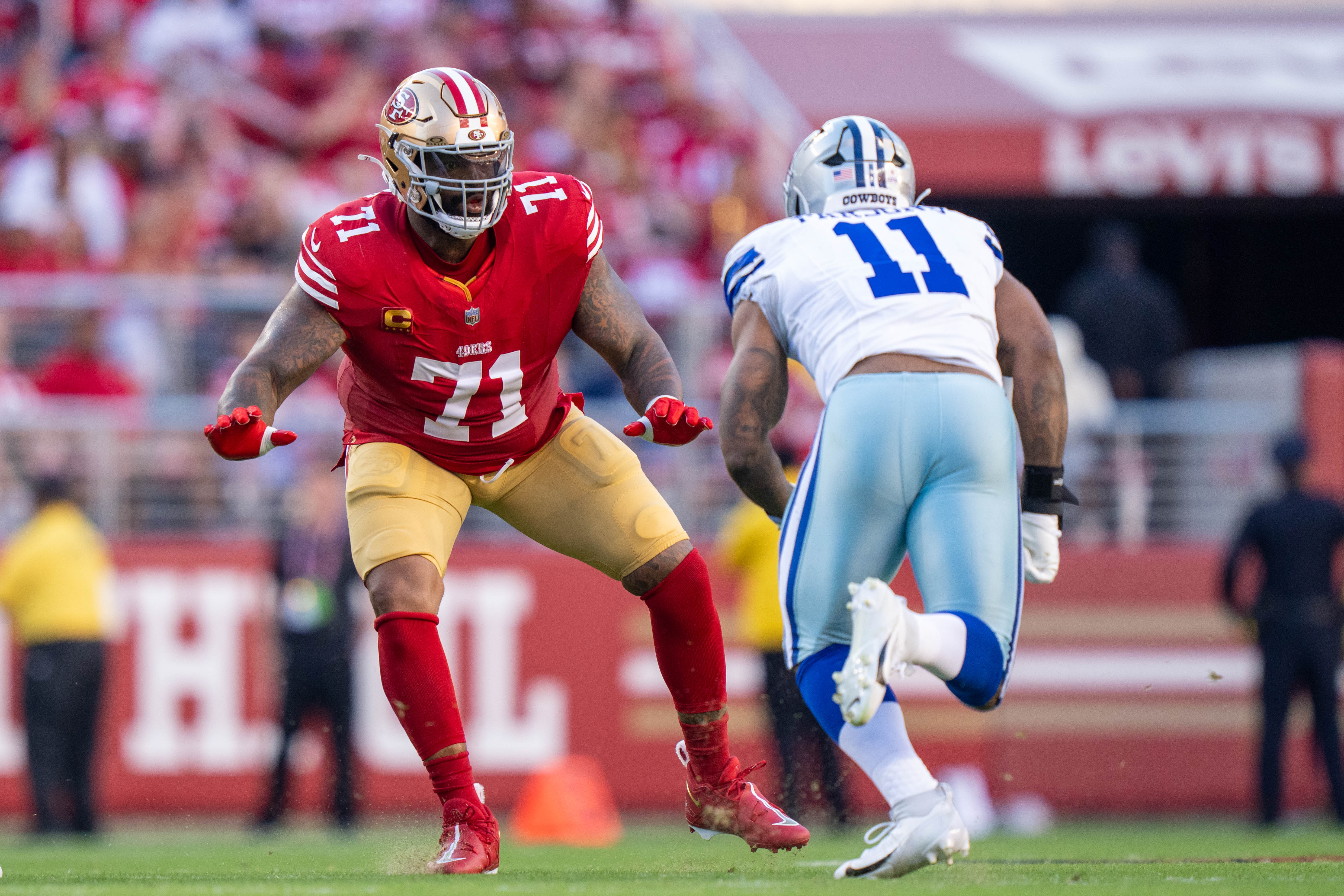 October 8, 2023; Santa Clara, California, USA; San Francisco 49ers offensive tackle Trent Williams (71) blocks Dallas Cowboys linebacker Micah Parsons (11) during the first quarter at Levi's Stadium.