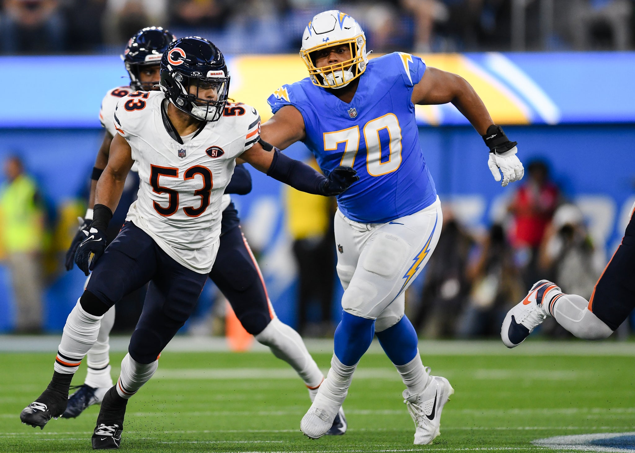 Oct 29, 2023; Inglewood, California, USA; Los Angeles Chargers offensive tackle Rashawn Slater (70) attempts to block Chicago Bears linebacker T.J. Edwards (53) during the second quarter at SoFi Stadium.