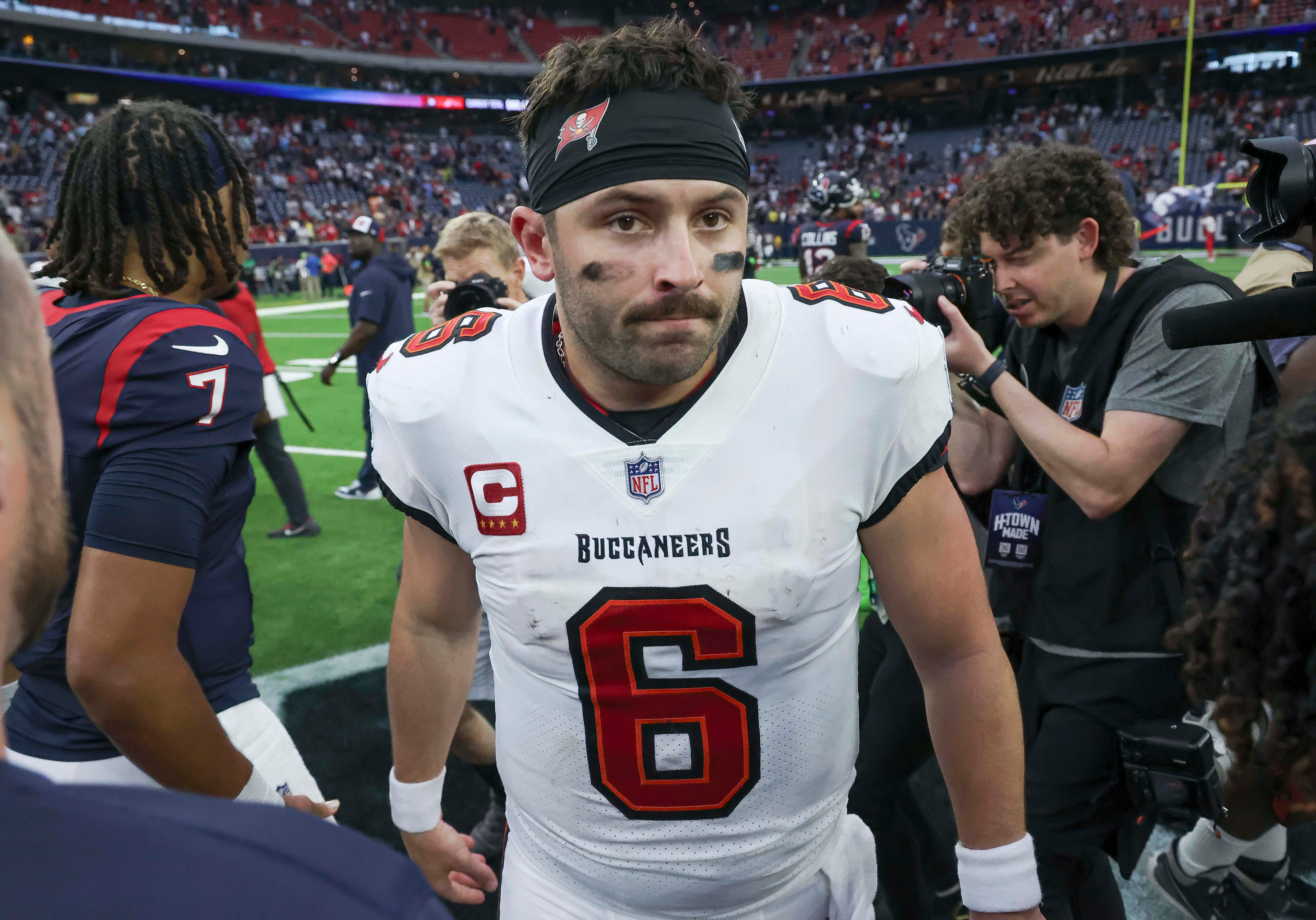 Nov 5, 2023; Houston, Texas, USA; Tampa Bay Buccaneers quarterback Baker Mayfield (6) walks on the field after the game against the Houston Texans at NRG Stadium. Mandatory Credit: Troy Taormina-USA TODAY Sports