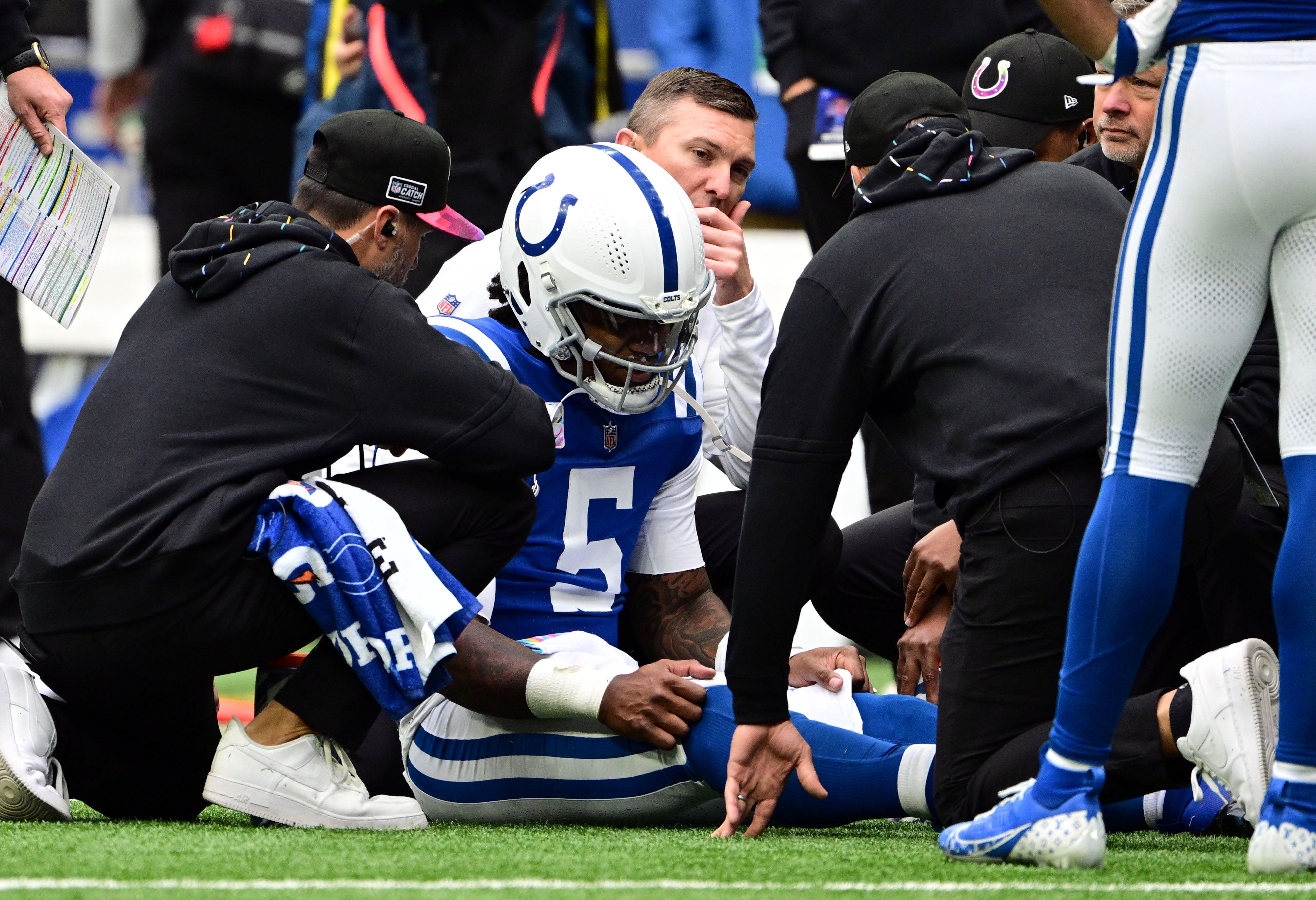 Oct 8, 2023; Indianapolis, Indiana, USA; Indianapolis Colts quarterback Anthony Richardson (5) sits on the field with a shoulder injury during the second quarter against the Tennessee Titans at Lucas Oil Stadium.