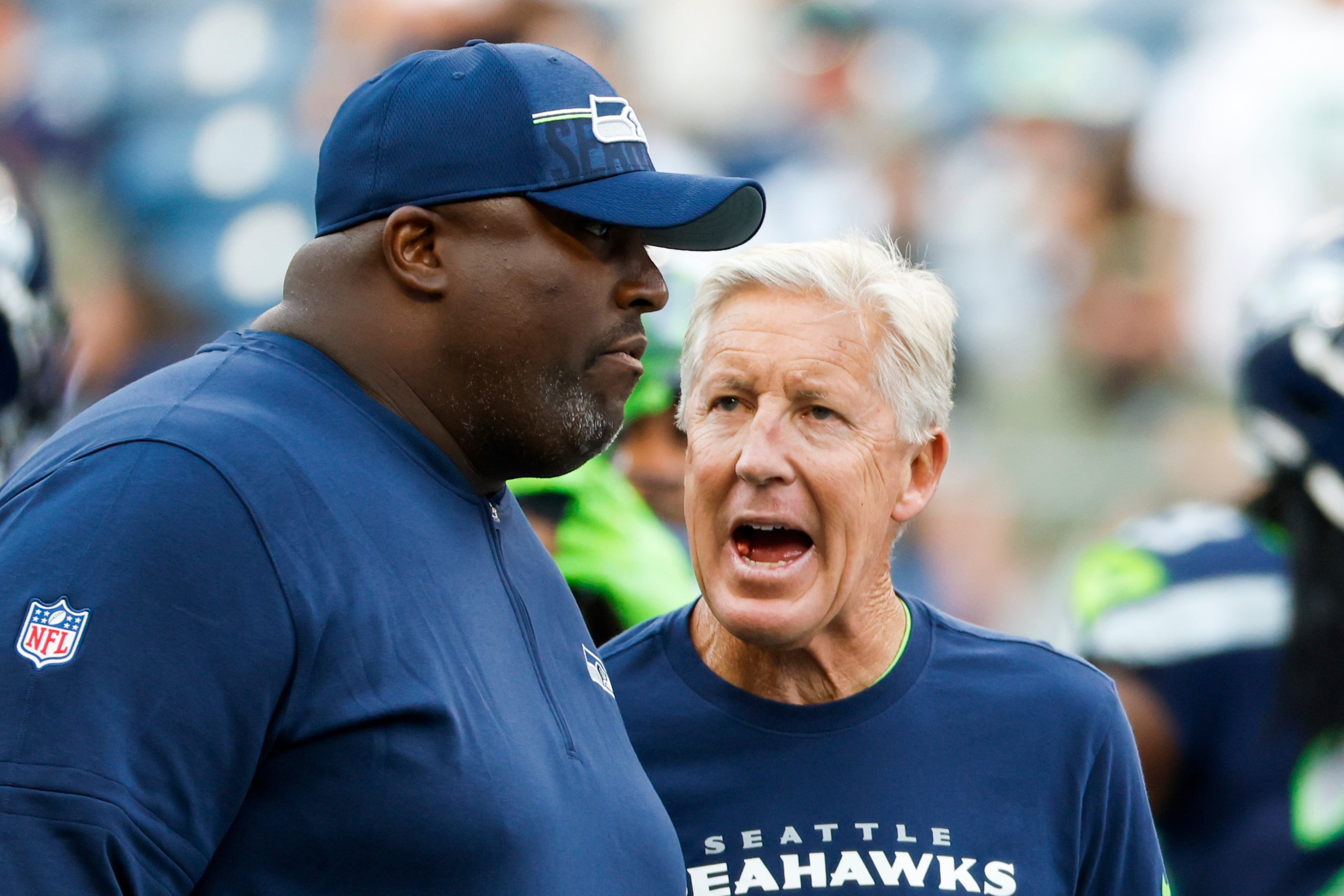 Aug 19, 2023; Seattle, Washington, USA; Seattle Seahawks head coach Pete Carroll, right, talks with defensive coordinator Clint Hurtt before a game against the Dallas Cowboys at Lumen Field. Mandatory Credit: Joe Nicholson-USA TODAY Sports