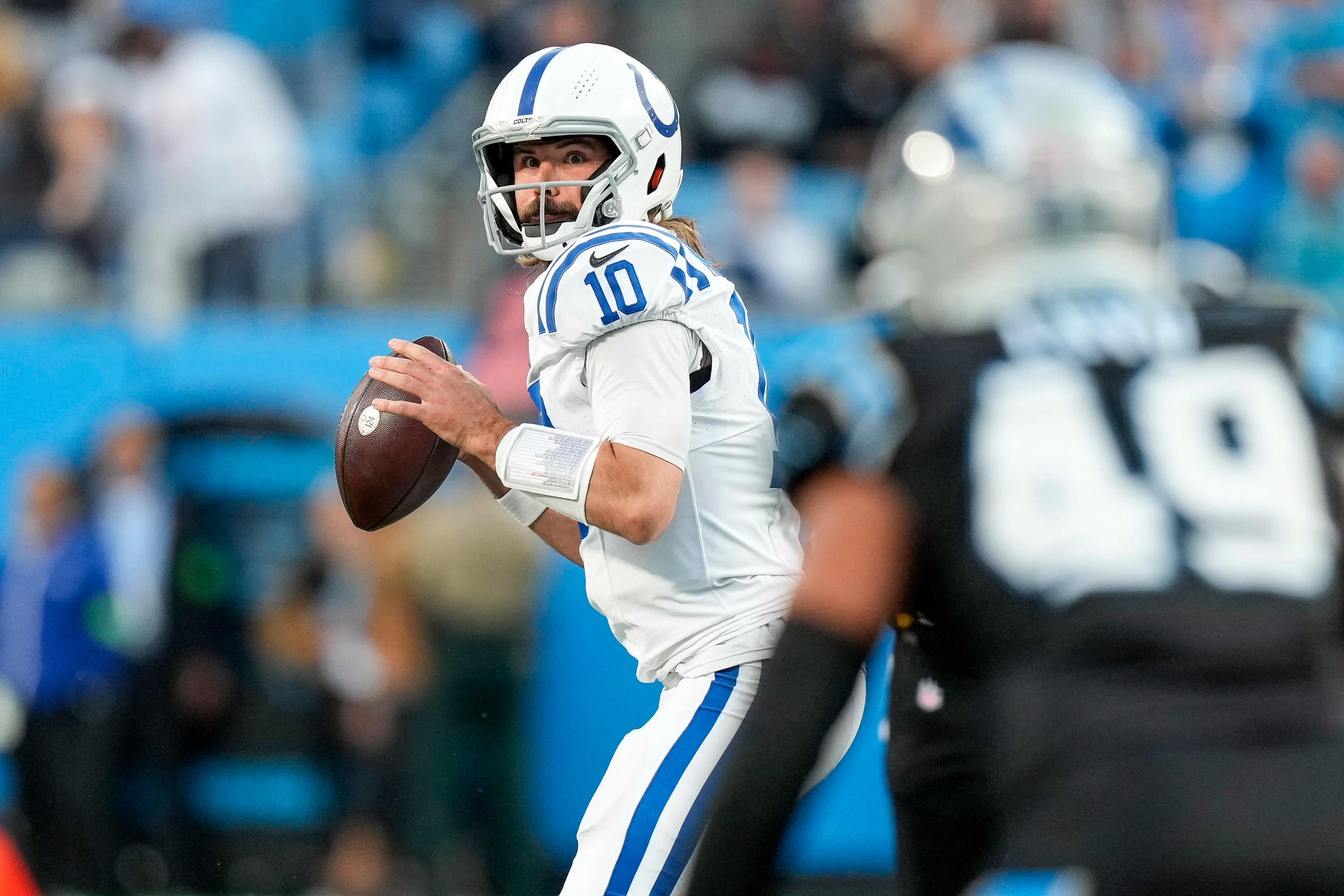 Nov 5, 2023; Charlotte, North Carolina, USA; Indianapolis Colts quarterback Gardner Minshew (10) looks for a receiver against the Carolina Panthers during the first quarter at Bank of America Stadium.