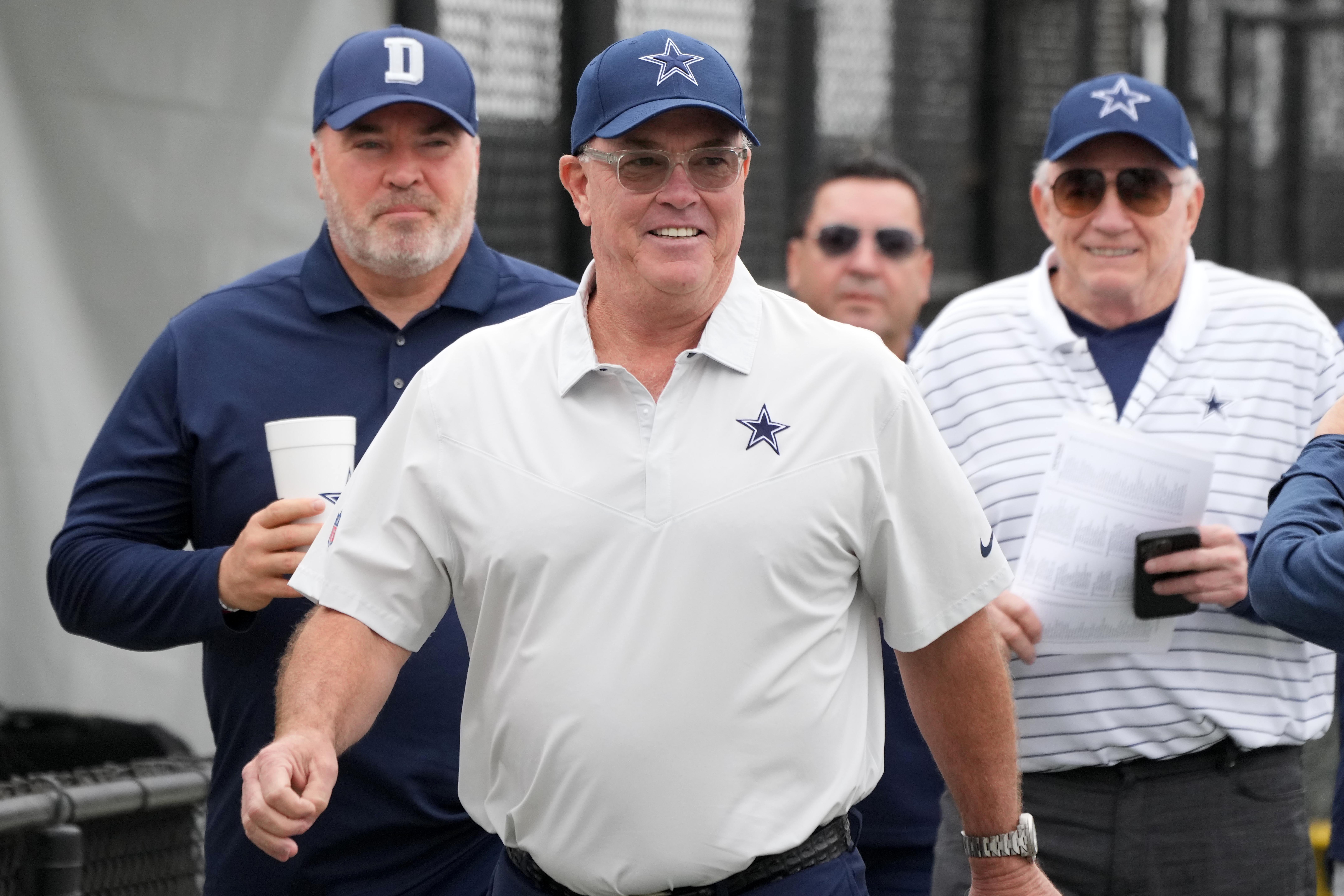 Dallas Cowboys chief operating officer Stephen Jones (center) arrives with coach Mike McCarthy (left) and owner Jerry Jones at training camp press conference at the River Ridge Fields. Mandatory Credit: Kirby Lee-USA TODAY Sports