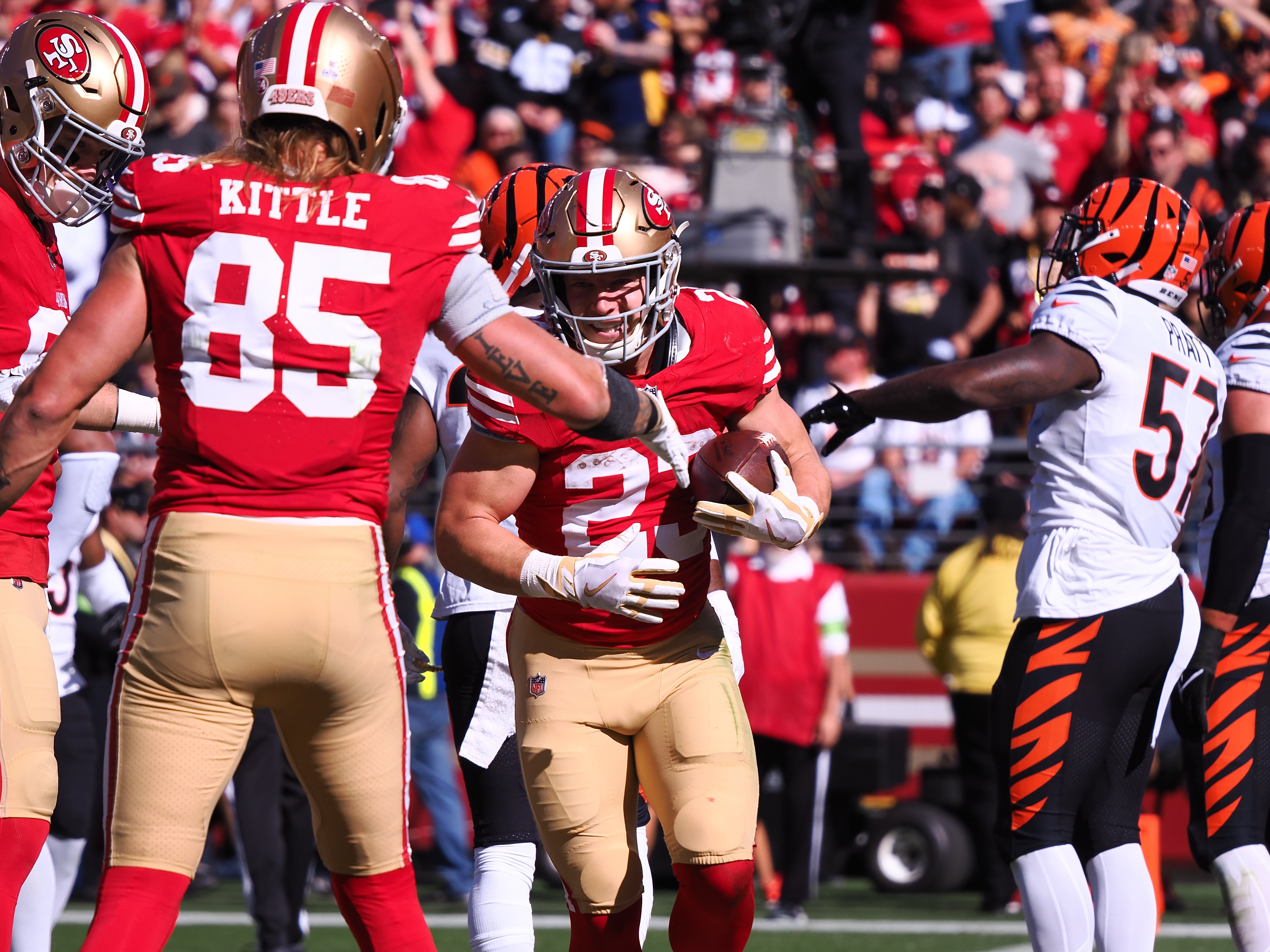 Oct 29, 2023; Santa Clara, California, USA; San Francisco 49ers running back Christian McCaffrey (23) celebrates with tight end George Kittle (85) after scoring a touchdown against the Cincinnati Bengals during the first quarter at Levi's Stadium.