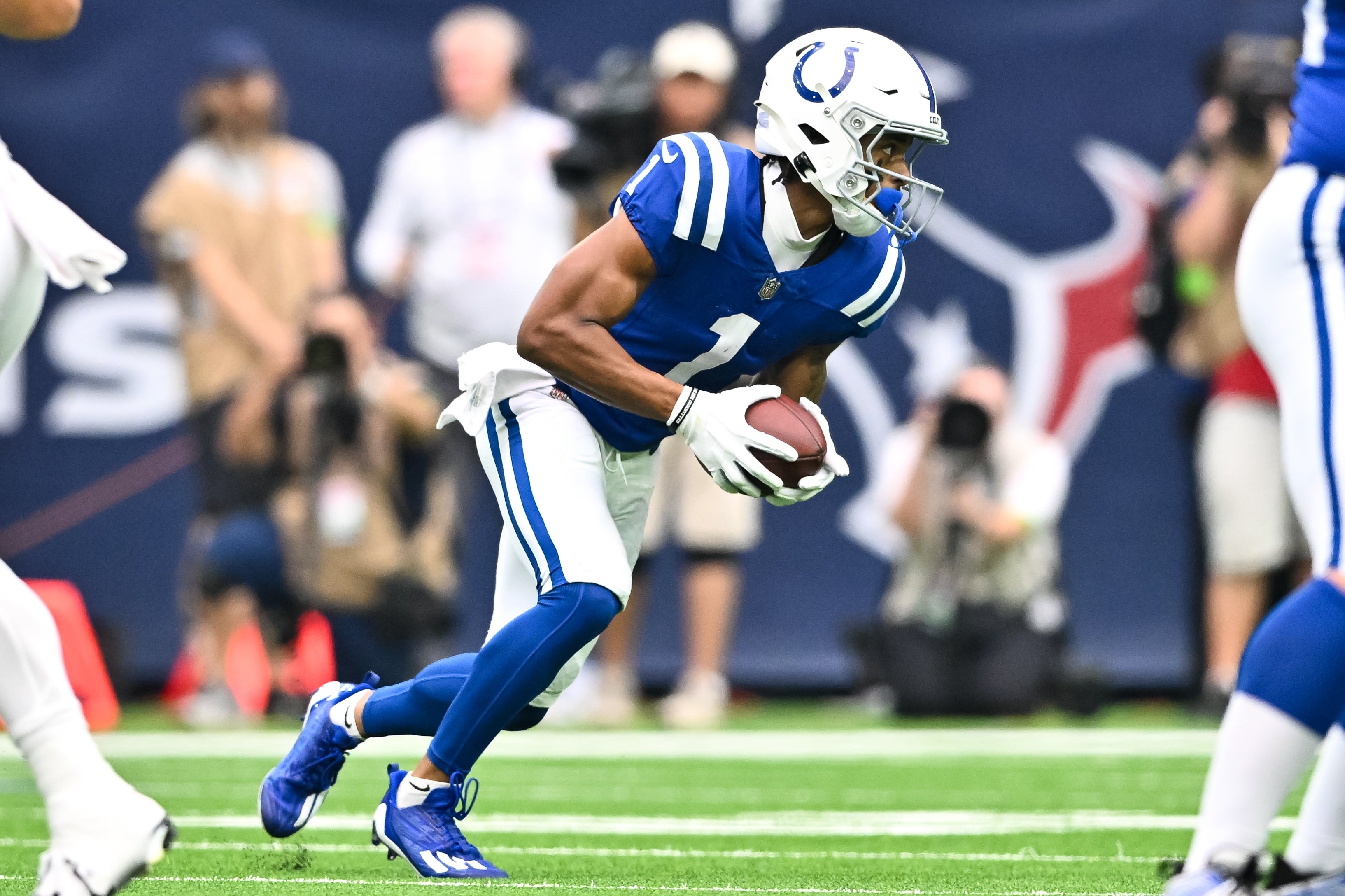 Sep 17, 2023; Houston, Texas, USA; Indianapolis Colts wide receiver Josh Downs (1) runs the ball during the first quarter against the Houston Texans at NRG Stadium.