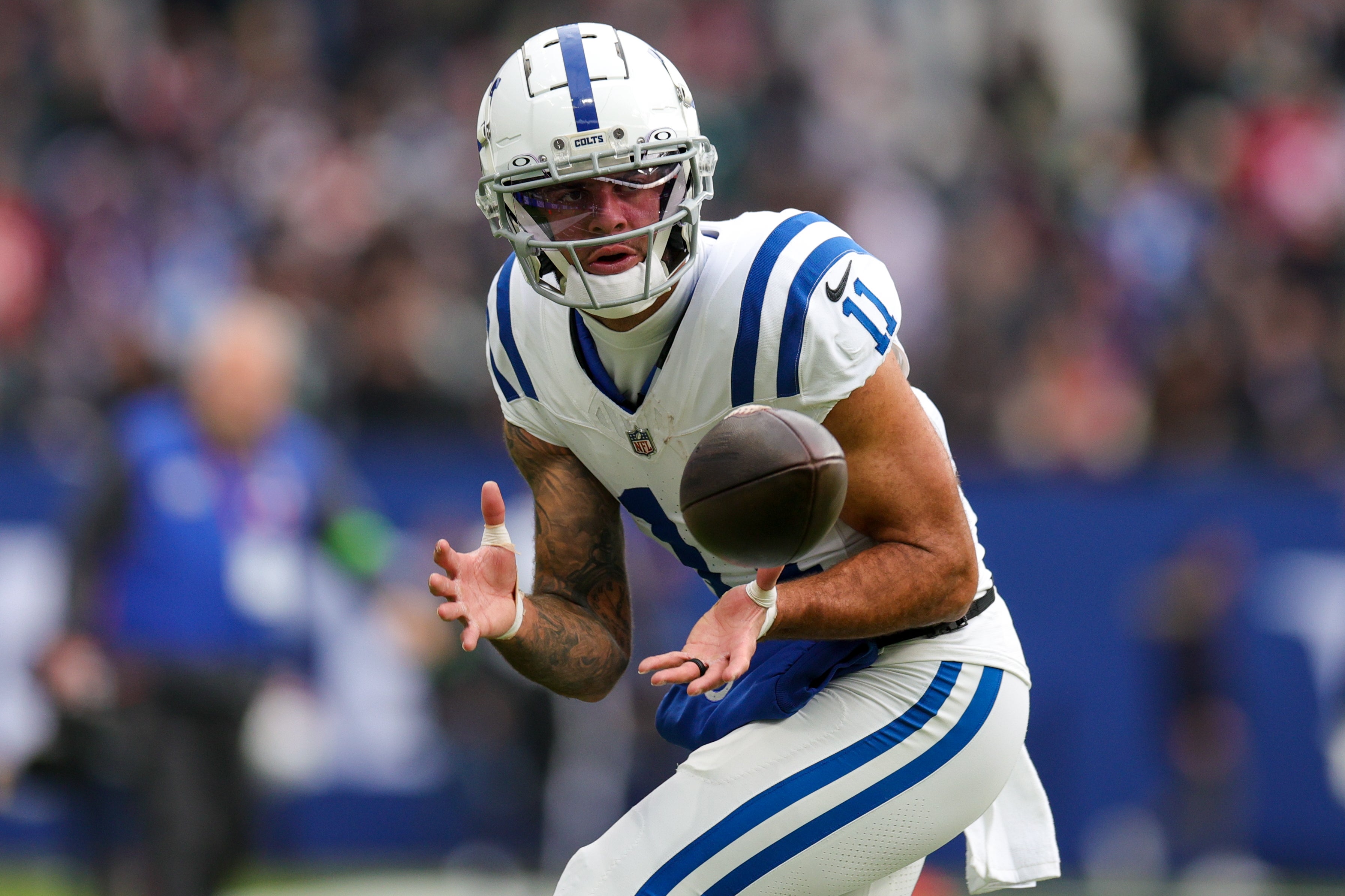 Nov 12, 2023; Frankfurt, Germany; Indianapolis Colts wide receiver Michael Pittman Jr. (11) warms up before a game against the New England Patriots during an International Series game at Deutsche Bank Park.