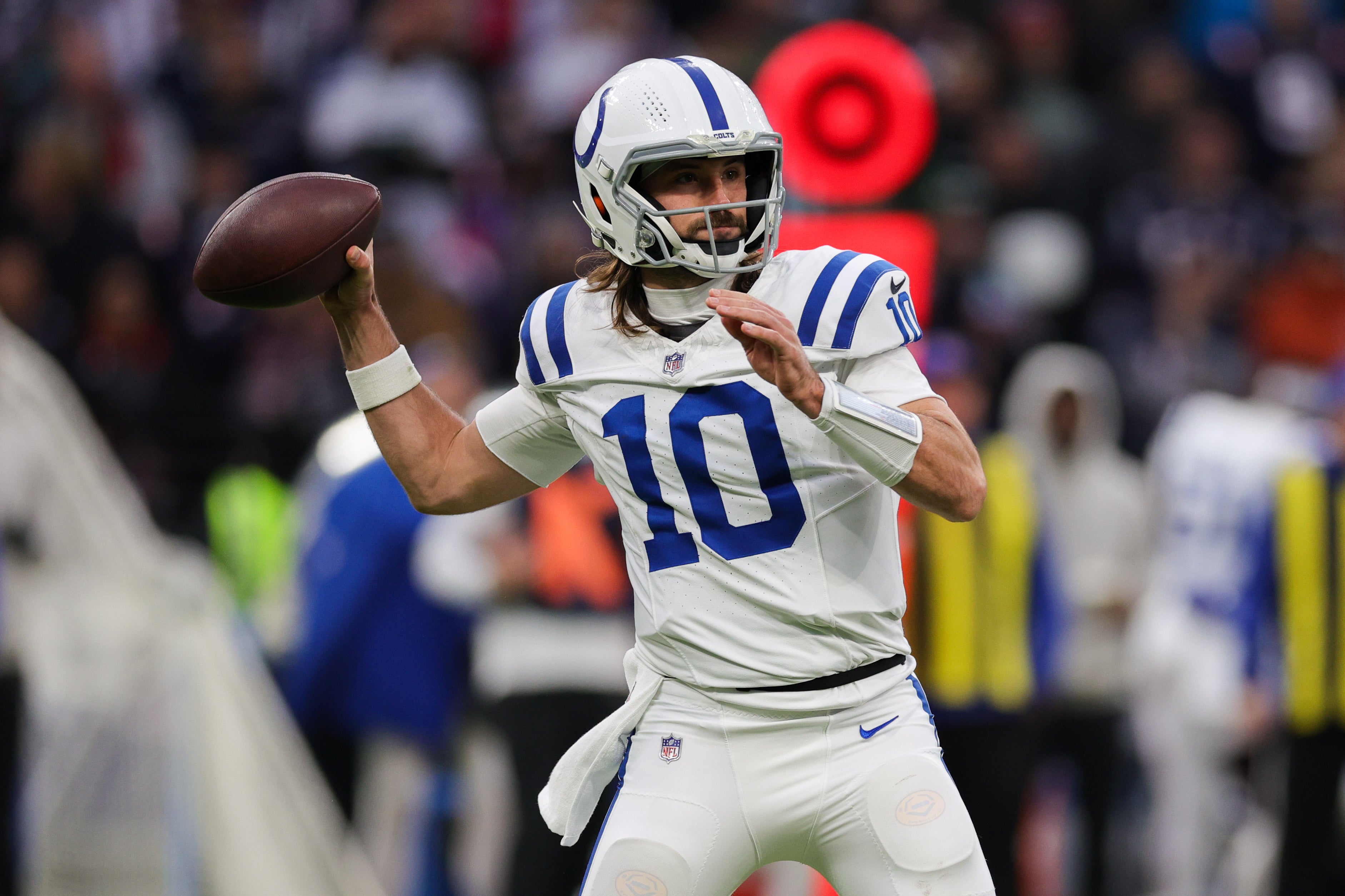 Nov 12, 2023; Frankfurt, Germany; Indianapolis Colts quarterback Gardner Minshew (10) drops back to pass against the New England Patriots in the second quarter during an International Series game at Deutsche Bank Park.