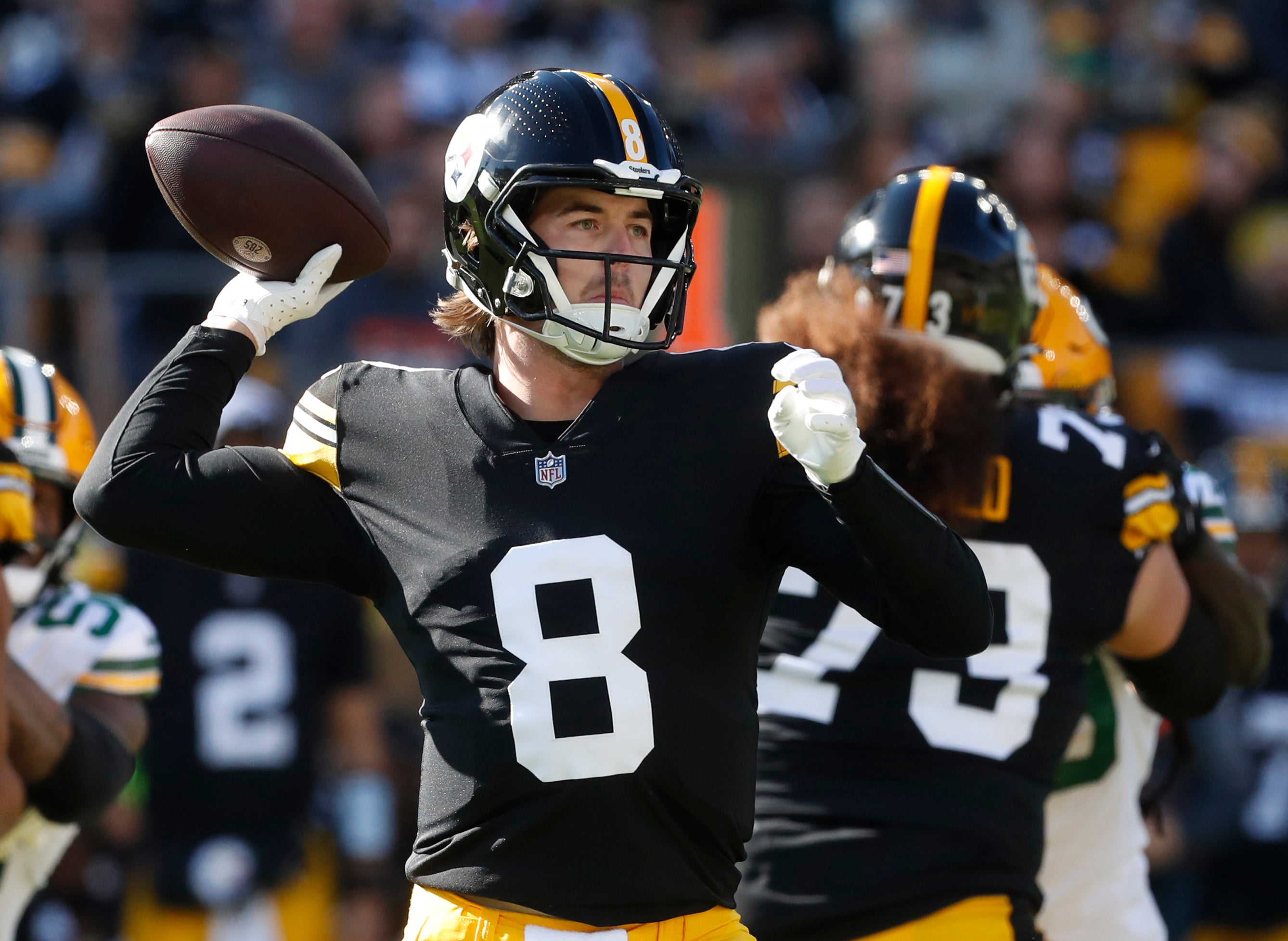 Nov 12, 2023; Pittsburgh, Pennsylvania, USA; Pittsburgh Steelers quarterback Kenny Pickett (8) passes the ball against the Green Bay Packers during the first quarter at Acrisure Stadium. Mandatory Credit: Charles LeClaire-USA TODAY Sports