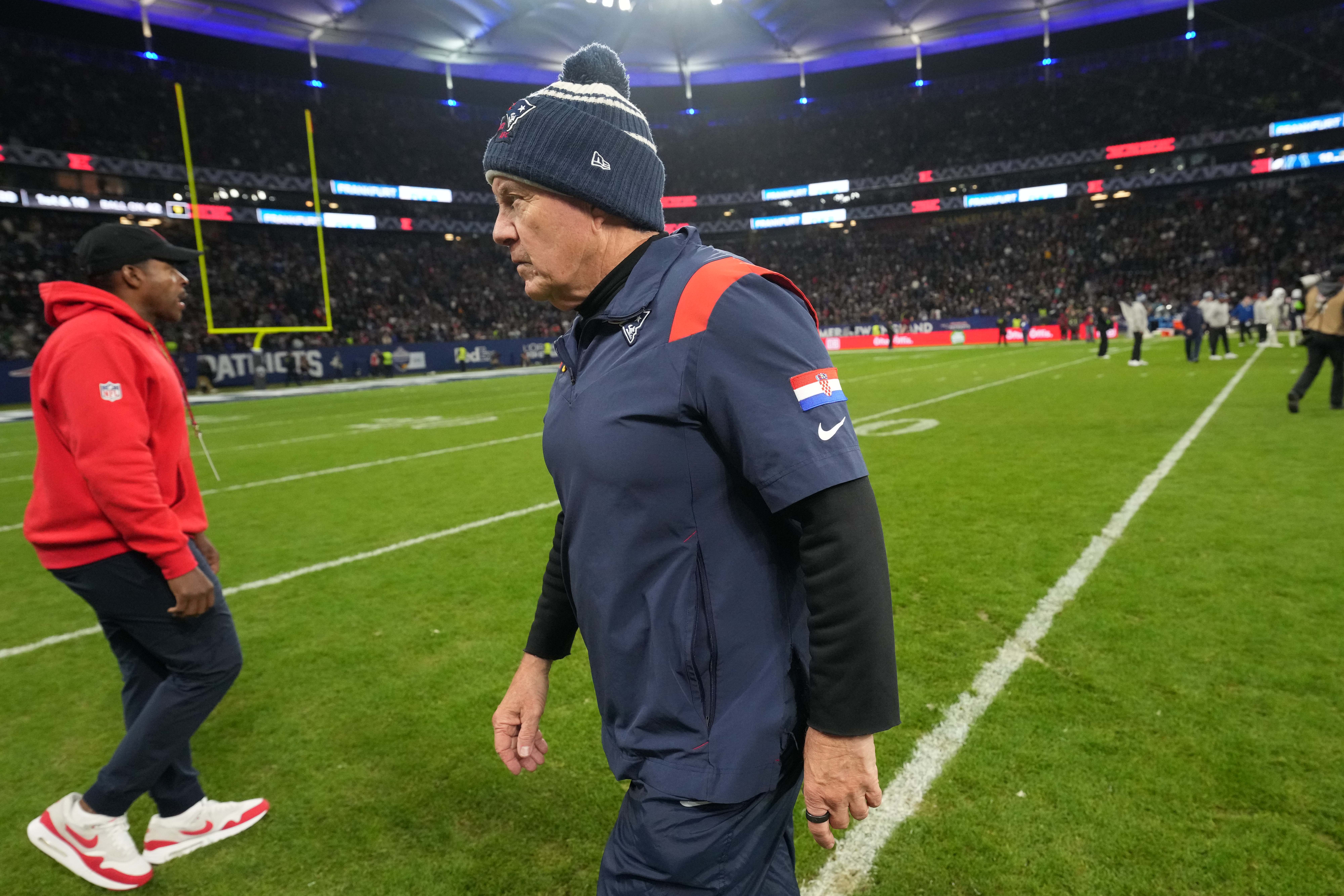 New England Patriots coach Bill Belichick leaves the field after an NFL International Series game against the Indianapolis Colts at Deutsche Bank Park