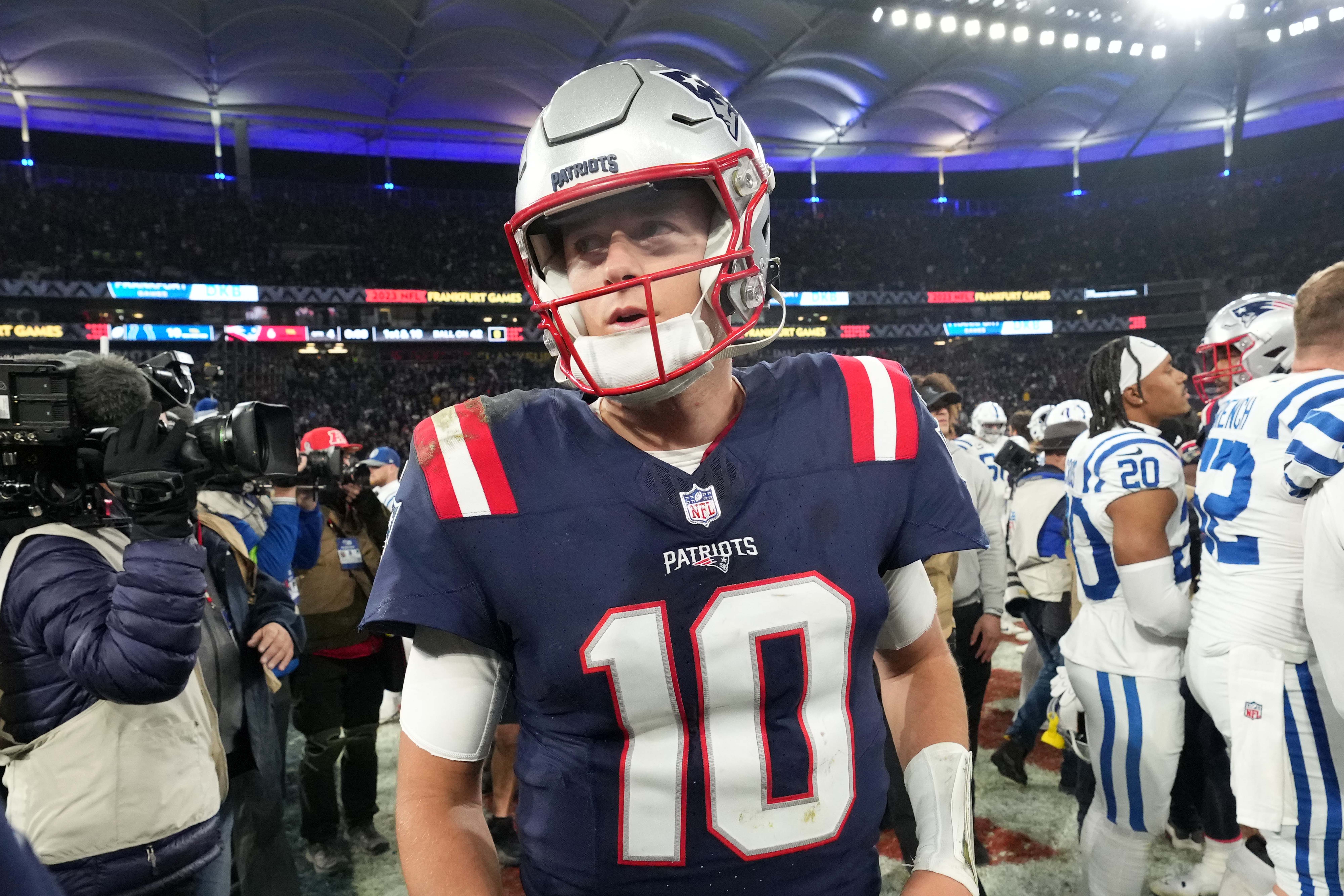 New England Patriots quarterback Mac Jones leaves the field after an NFL International Series game against the Indianapolis Colts at Deutsche Bank Park