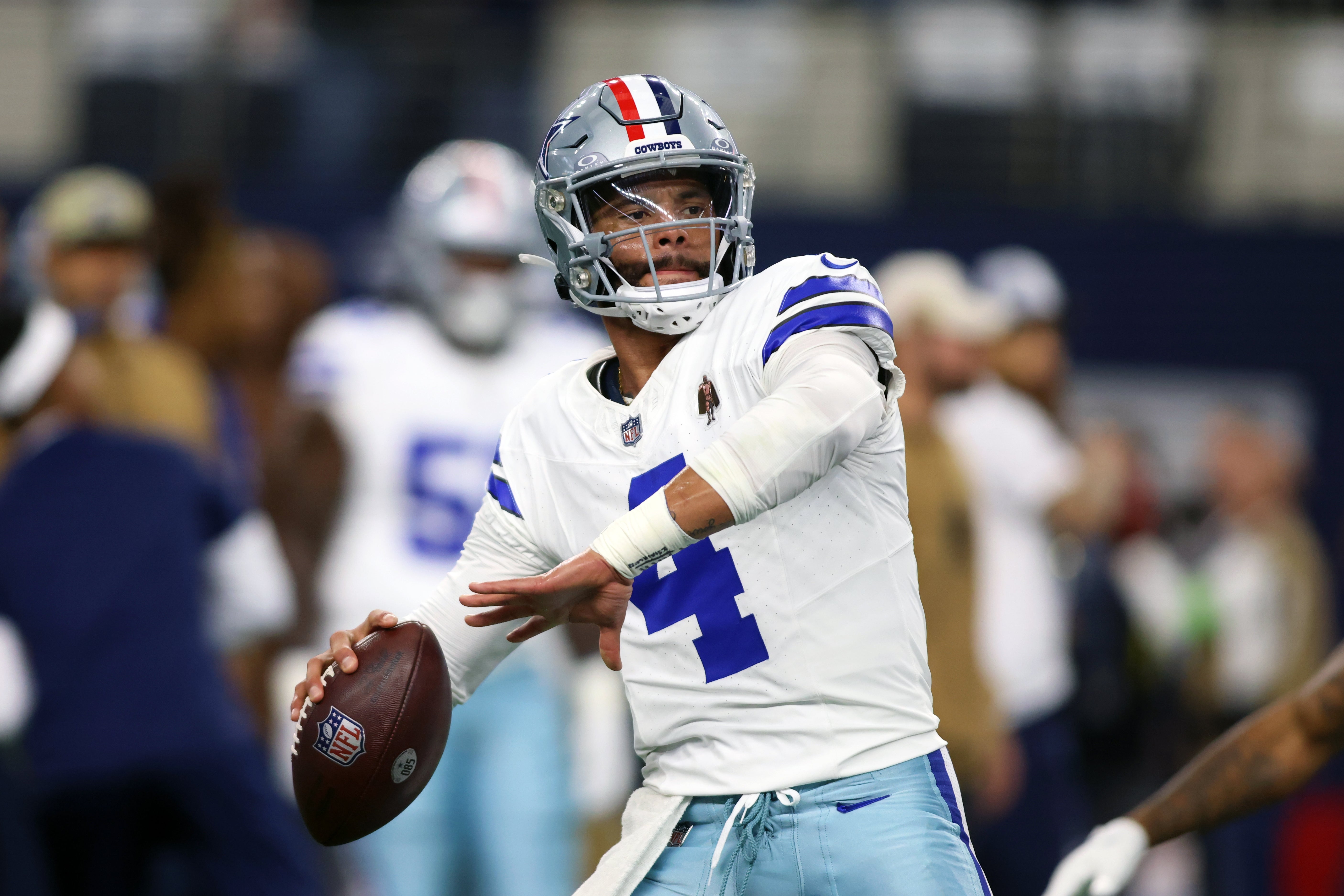 Dallas Cowboys quarterback Dak Prescott (4) throws a pass before the game against the New York Giants at AT&T Stadium.