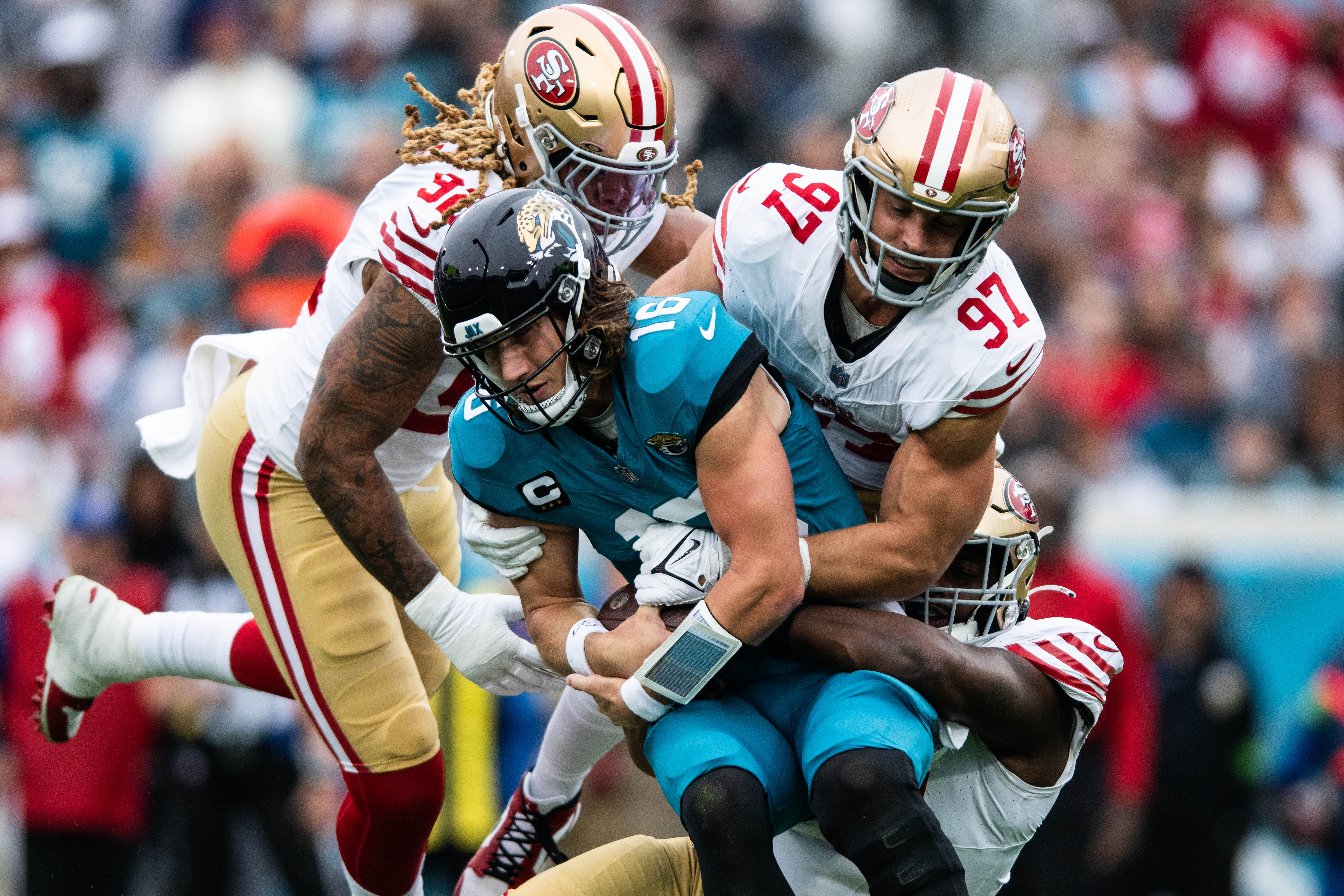 Nov 12, 2023; Jacksonville, Florida, USA; San Fransisco 49ers defensive lineman Nick Bosa (97) sacks Jacksonville Jaguars quarterback Trevor Lawrence (16) in the first quarter at EverBank Stadium.