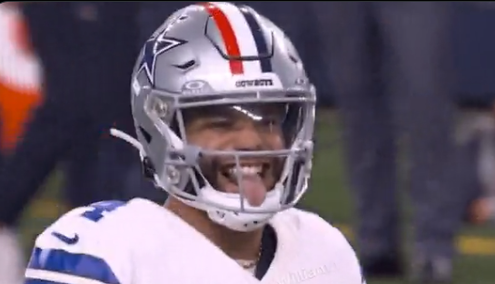 Dallas Cowboys quarterback Dak Prescott sticks his tongue out during win over New York Giants.