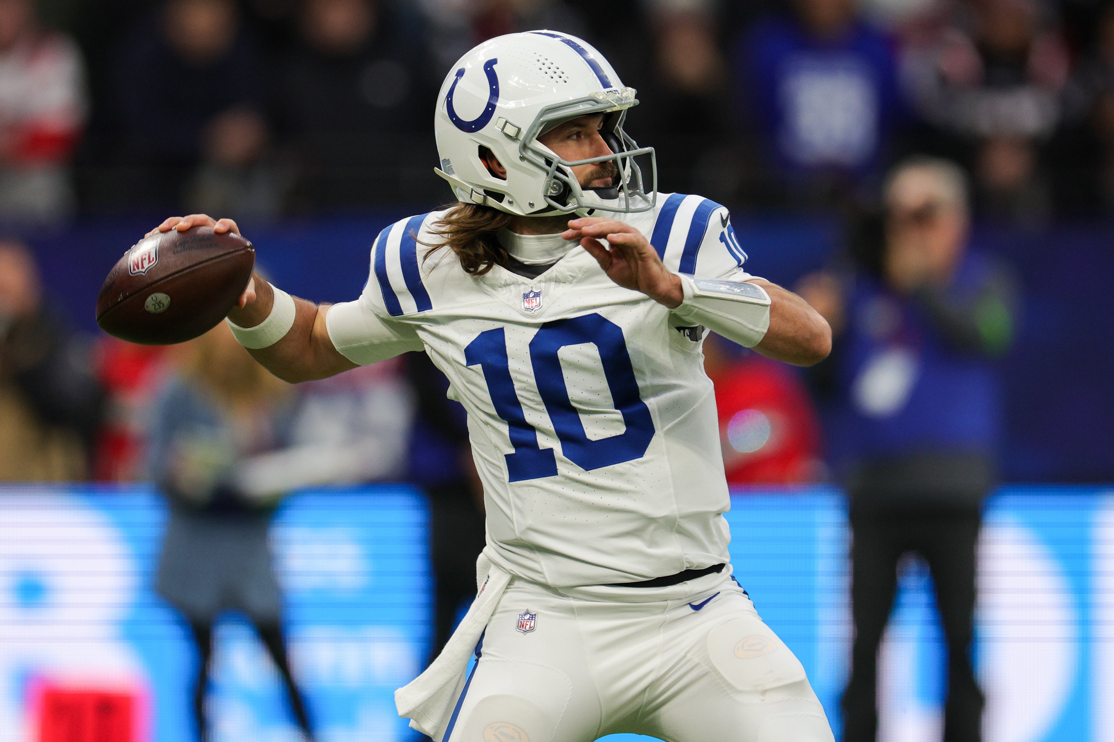 Nov 12, 2023; Frankfurt, Germany; Indianapolis Colts quarterback Gardner Minshew (10) drops back to pass against the New England Patriots in the second quarter during an International Series game at Deutsche Bank Park.